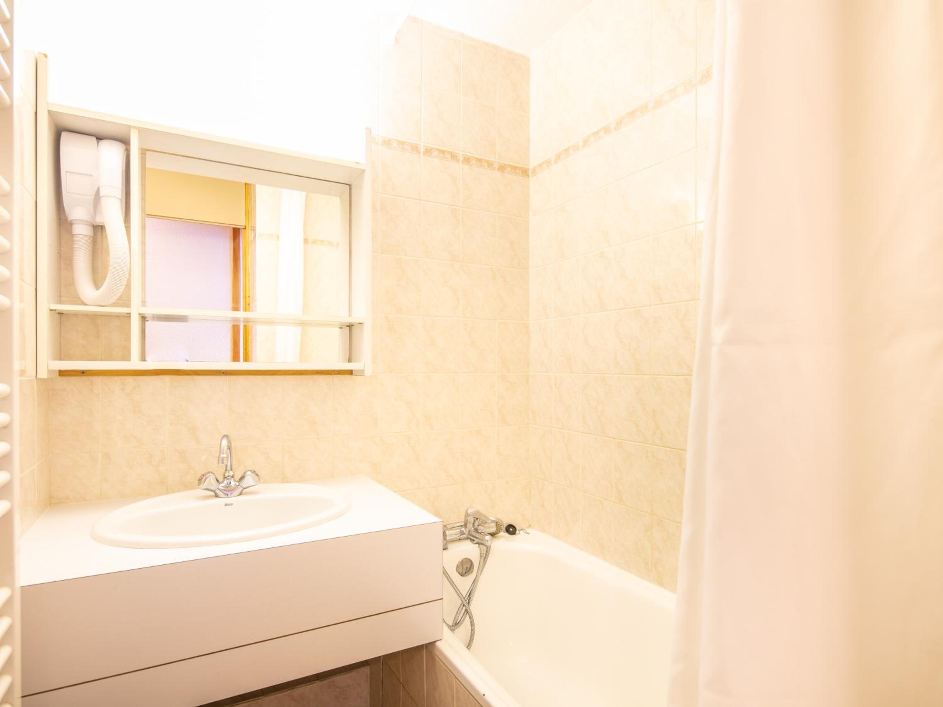 Three-Bedroom Apartment - Photo 8