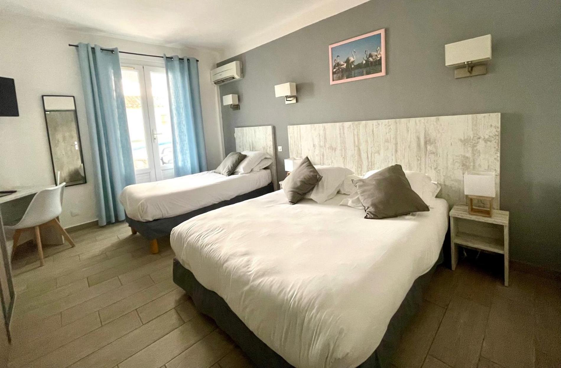 Comfort Triple Room with Balcony - Photo 1