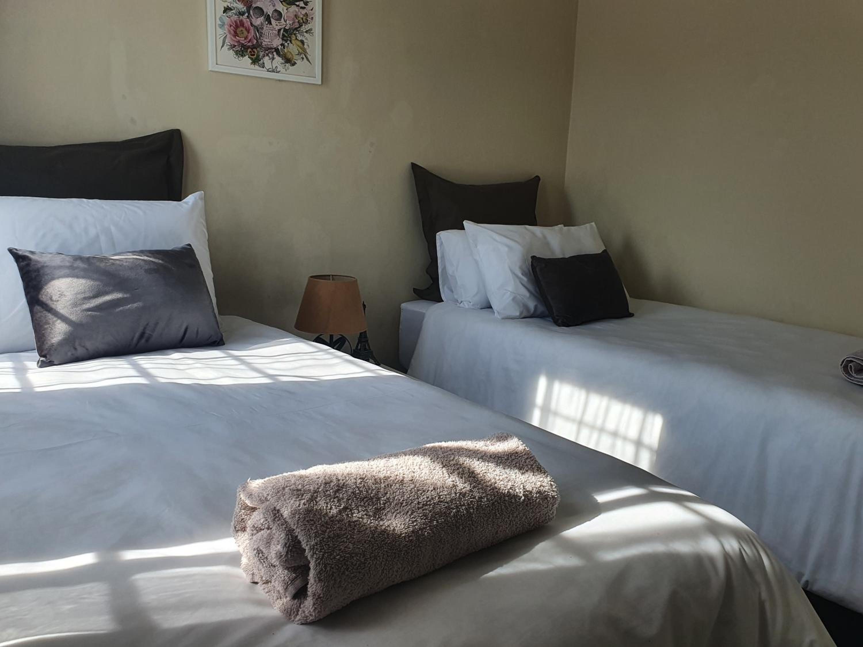 Three-Bedroom Apartment - Photo 40