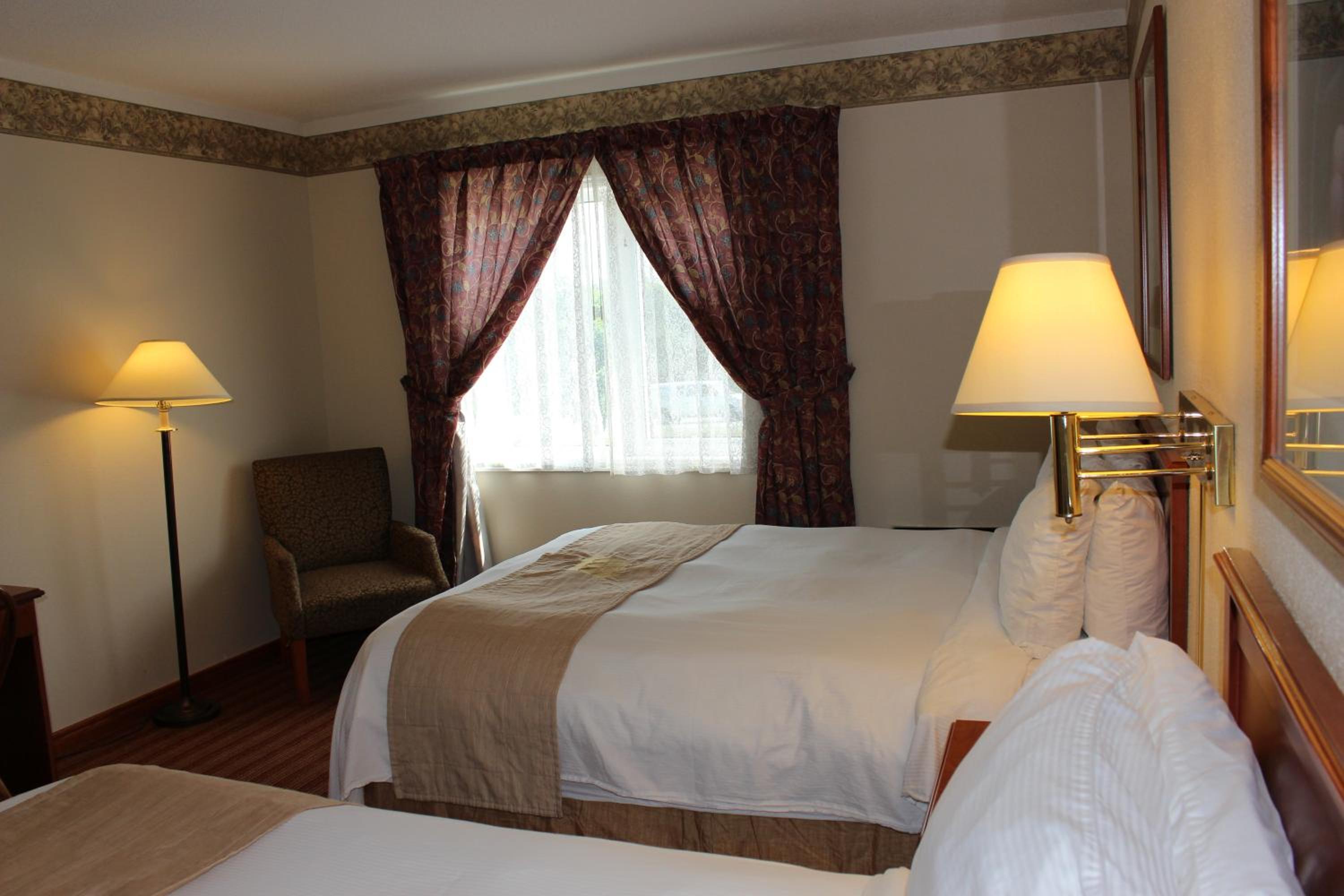Queen Room with Two Queen Beds - Photo 1