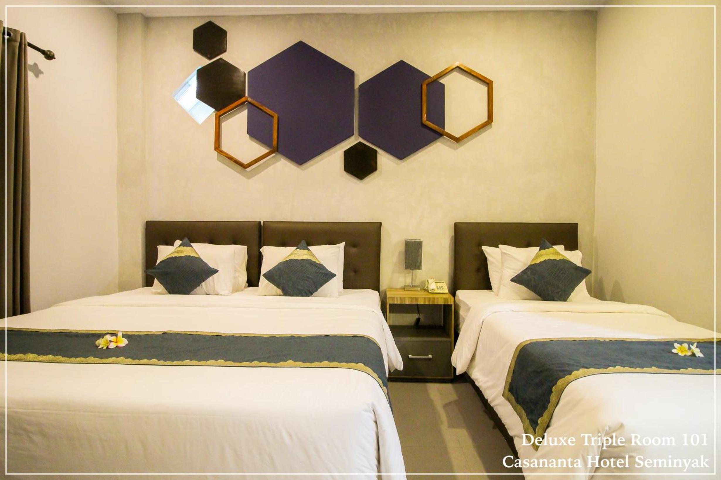 Deluxe Triple Room - Photo 15