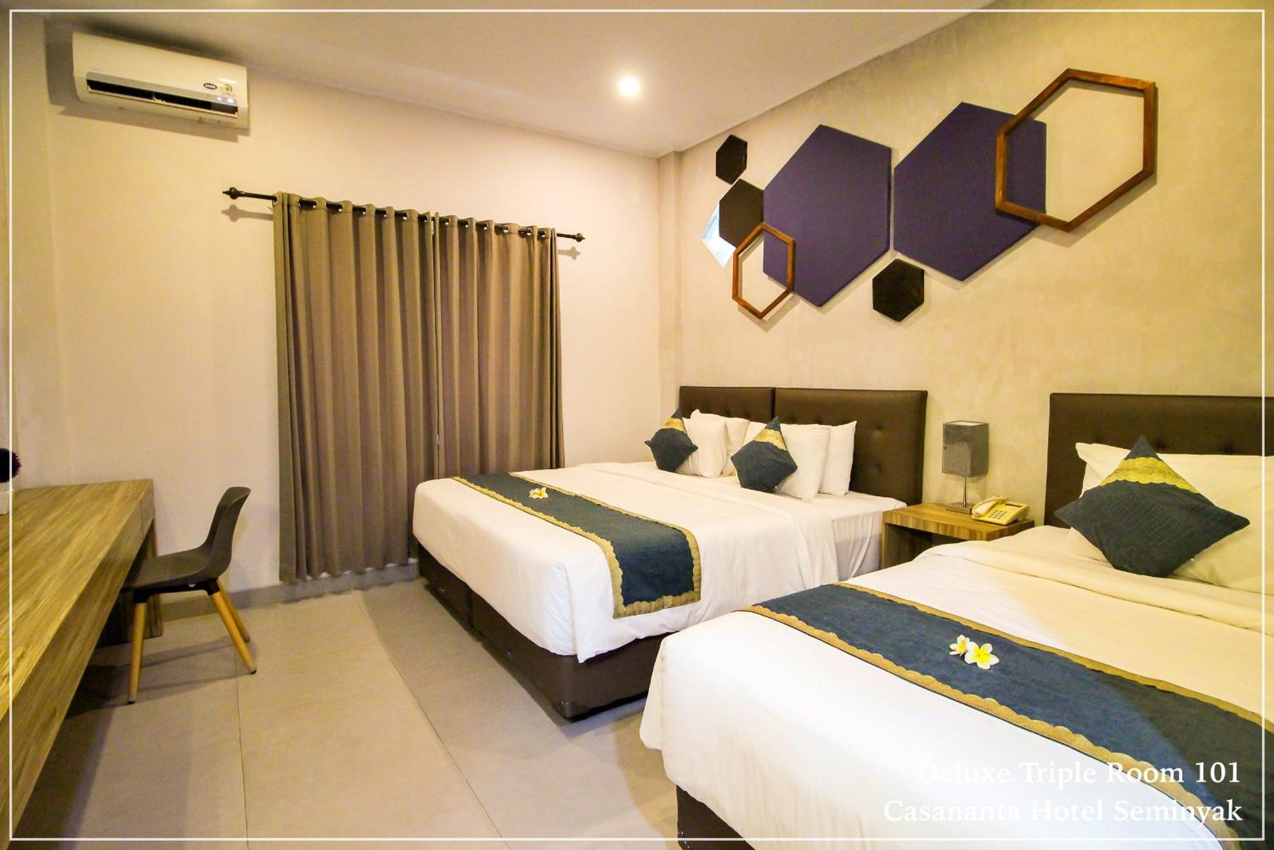 Deluxe Triple Room - Photo 13