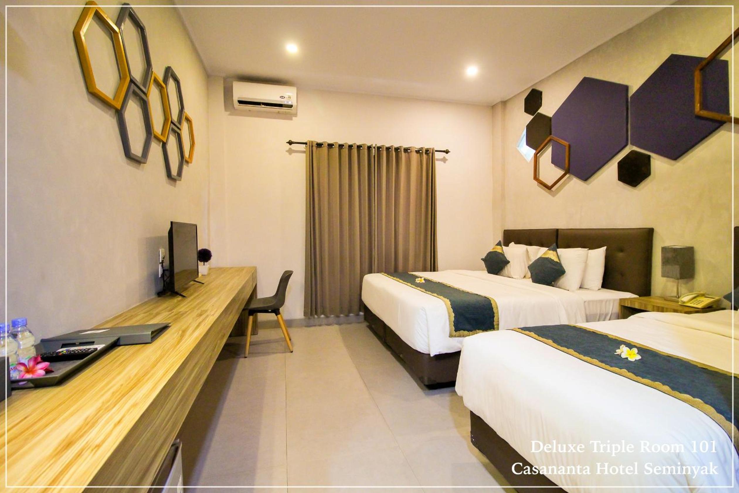 Deluxe Triple Room - Photo 11