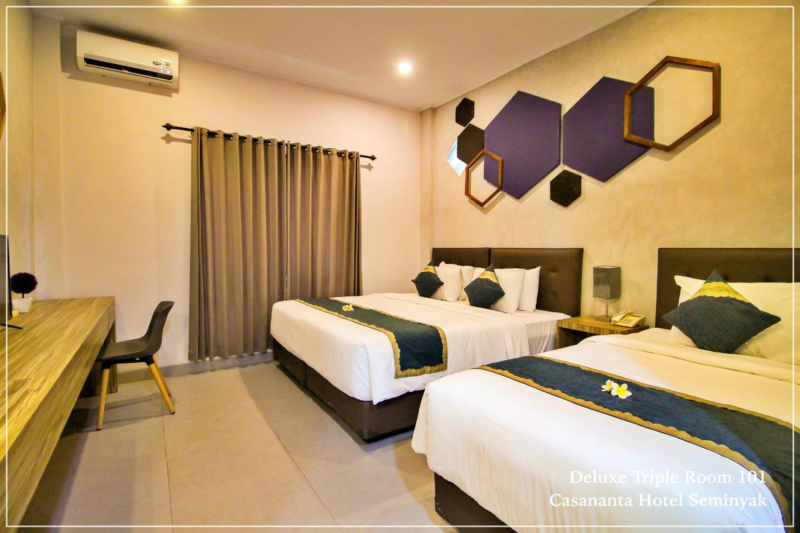 Deluxe Triple Room - Photo 2