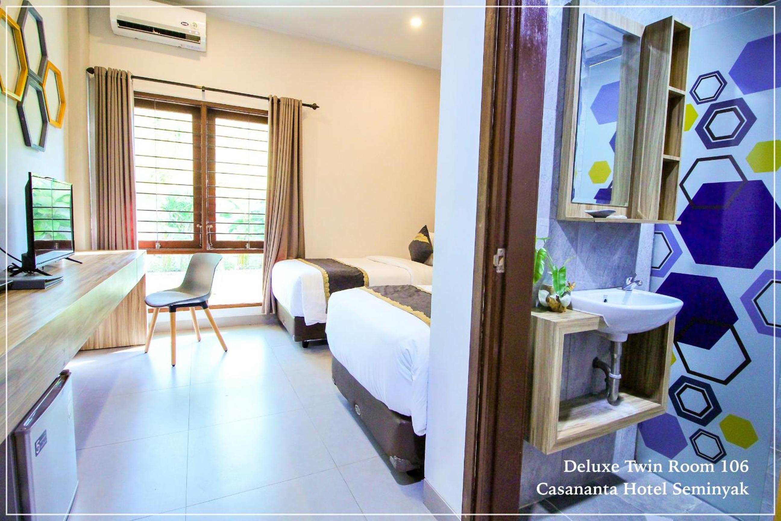 Deluxe Twin Room - Photo 9