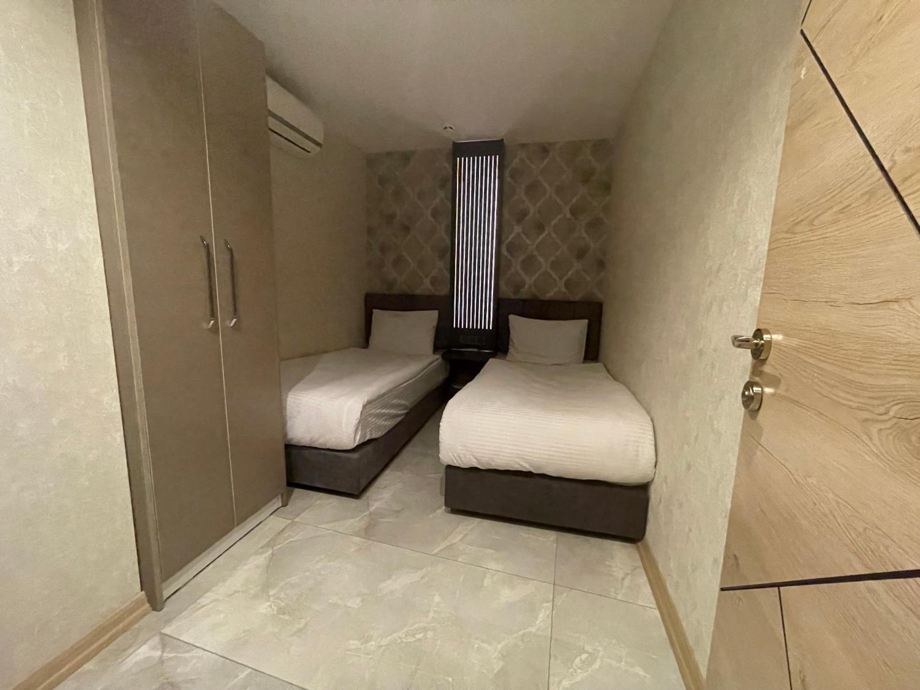Three-Bedroom Apartment - Photo 24