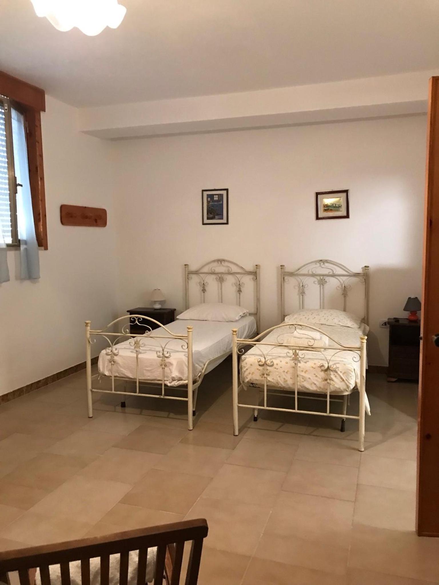 Standard Quadruple Room - Photo 11