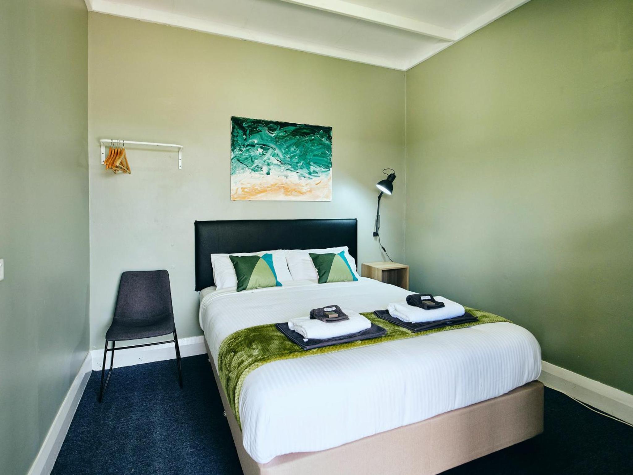 Queen Room with Shared Bathroom