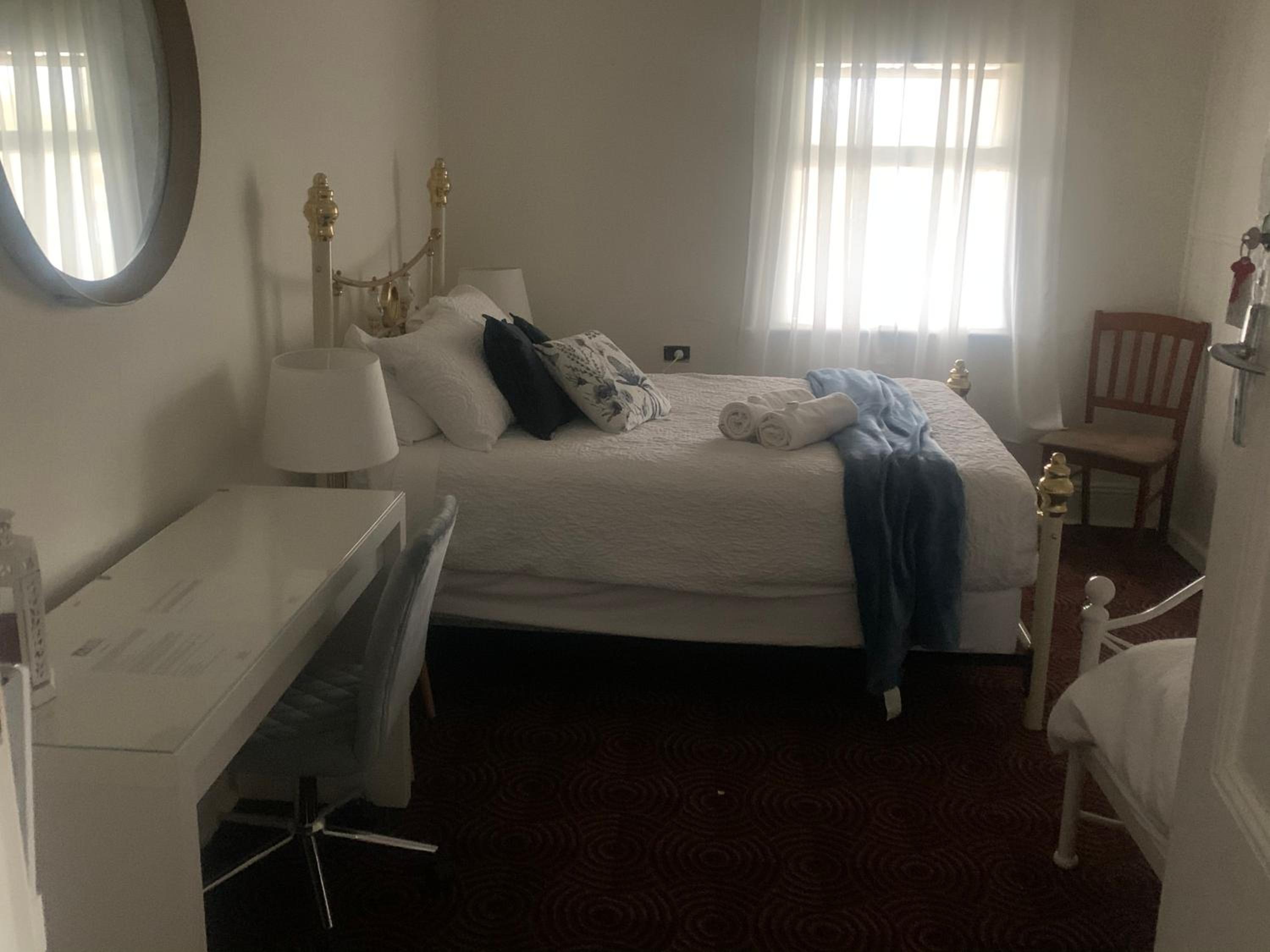 Standard Double Room with Shared Bathroom