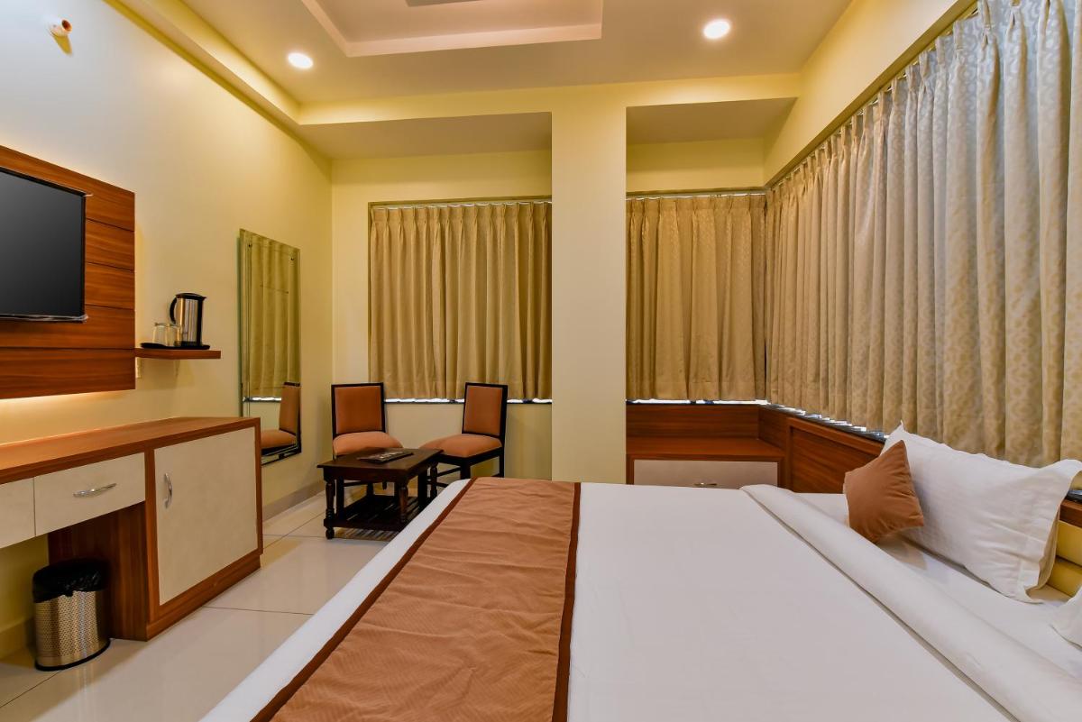 Deluxe Room - Photo 1