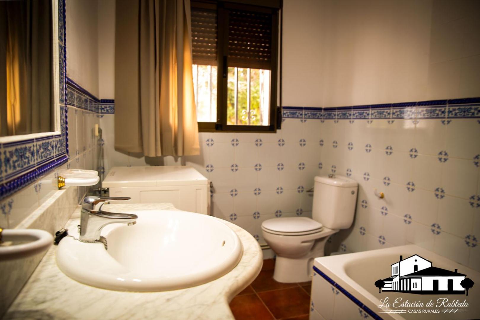 Three-Bedroom House - Photo 4