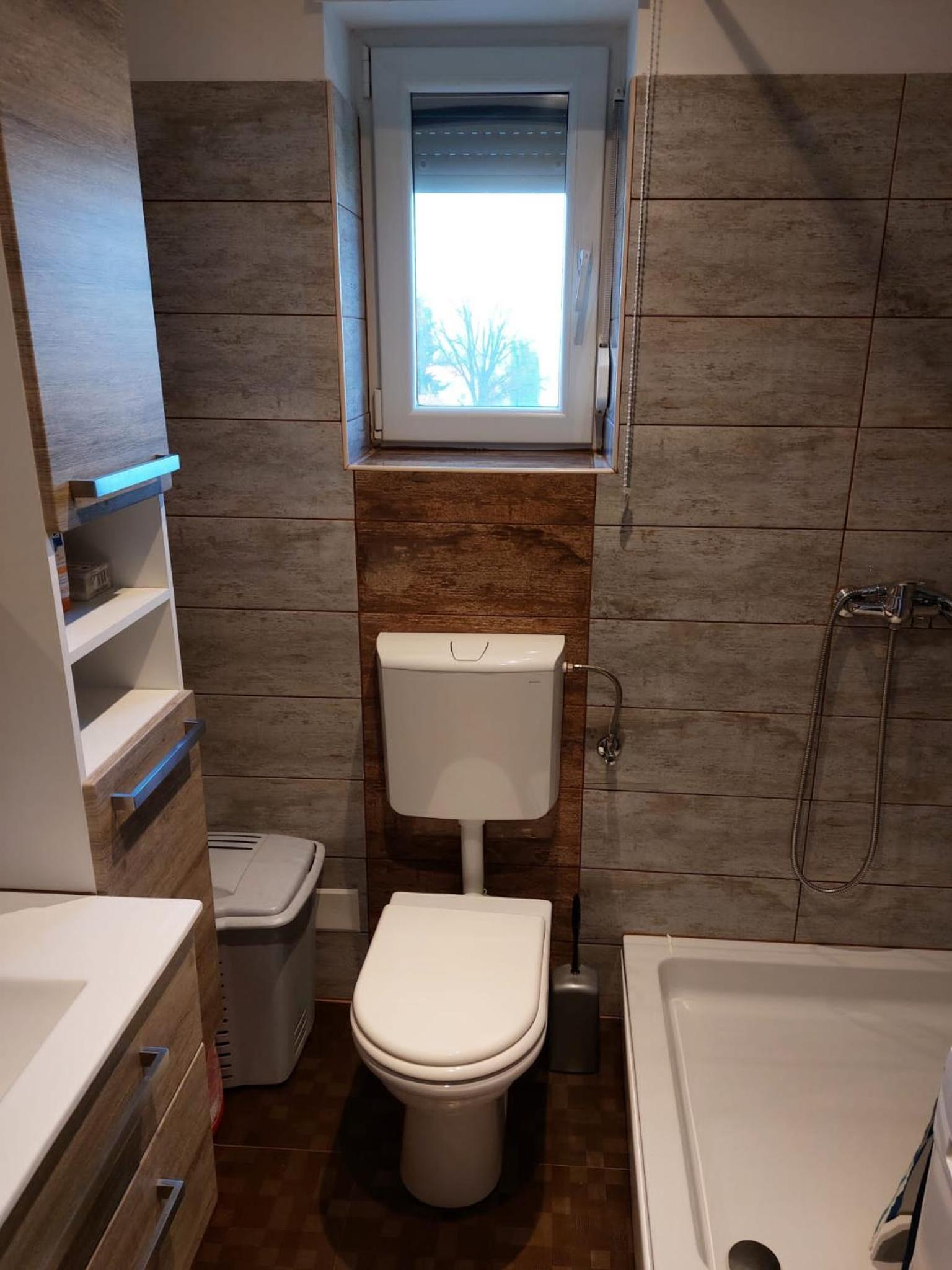 Two-Bedroom Apartment - Photo 40