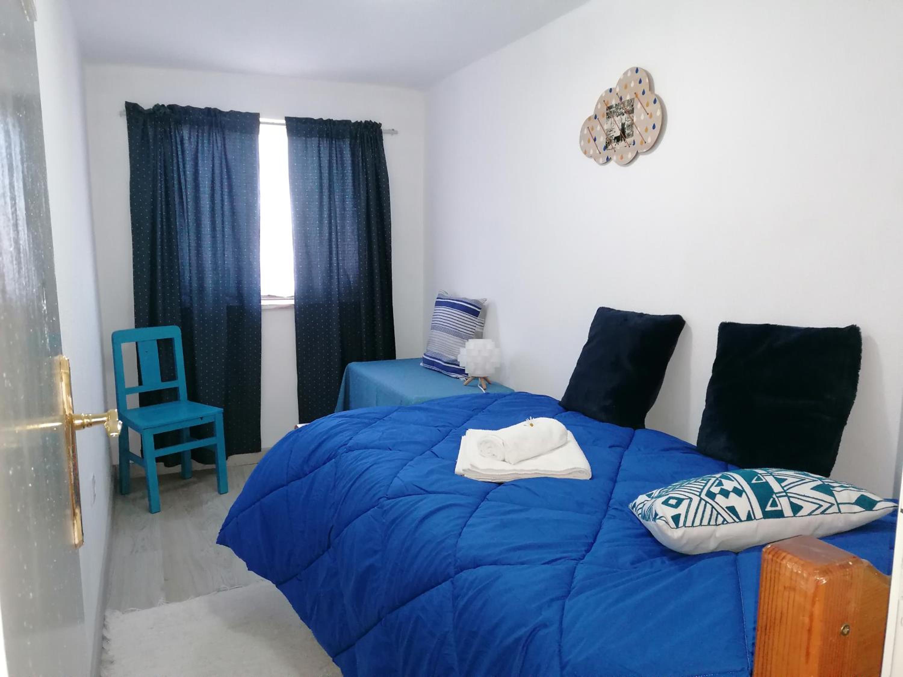 Three-Bedroom House - Photo 36