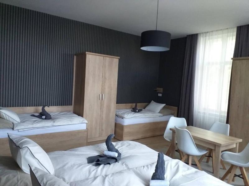 Quadruple Room with Balcony - Photo 1