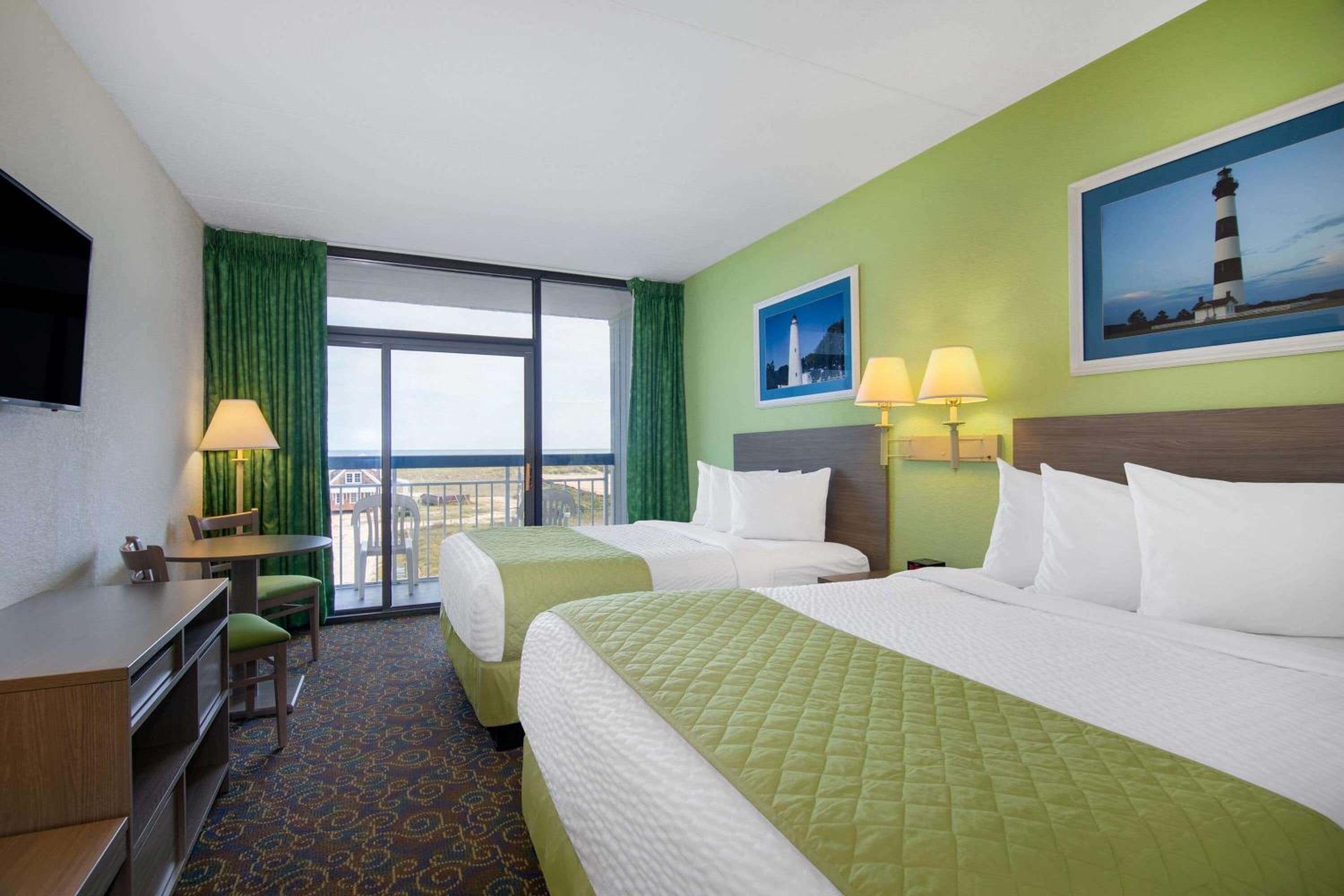 Queen Room with Two Queen Beds with Partial Ocean View- Non-Smoking  - Photo 1