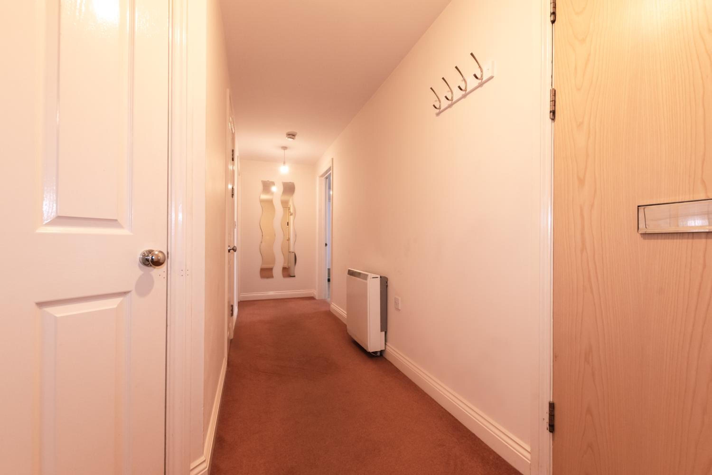 Three-Bedroom Apartment - Photo 21