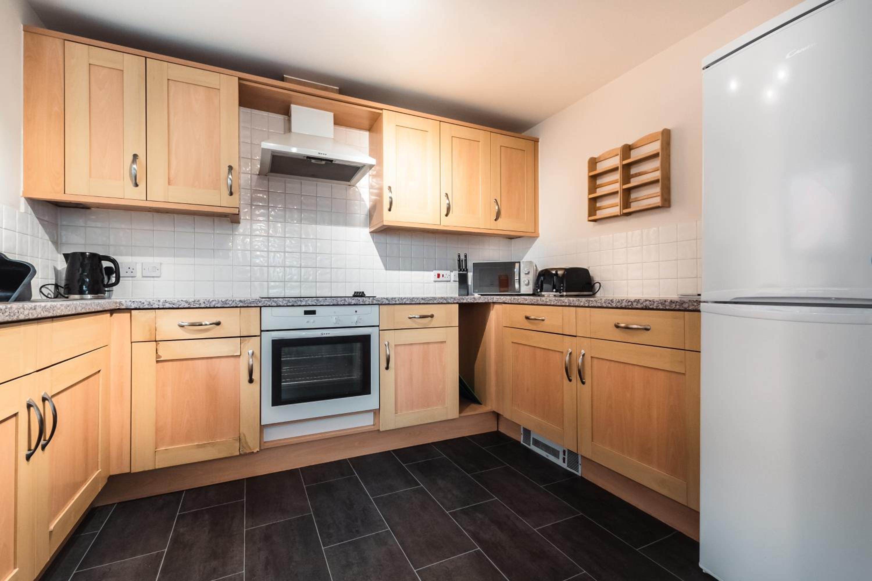 Three-Bedroom Apartment - Photo 26