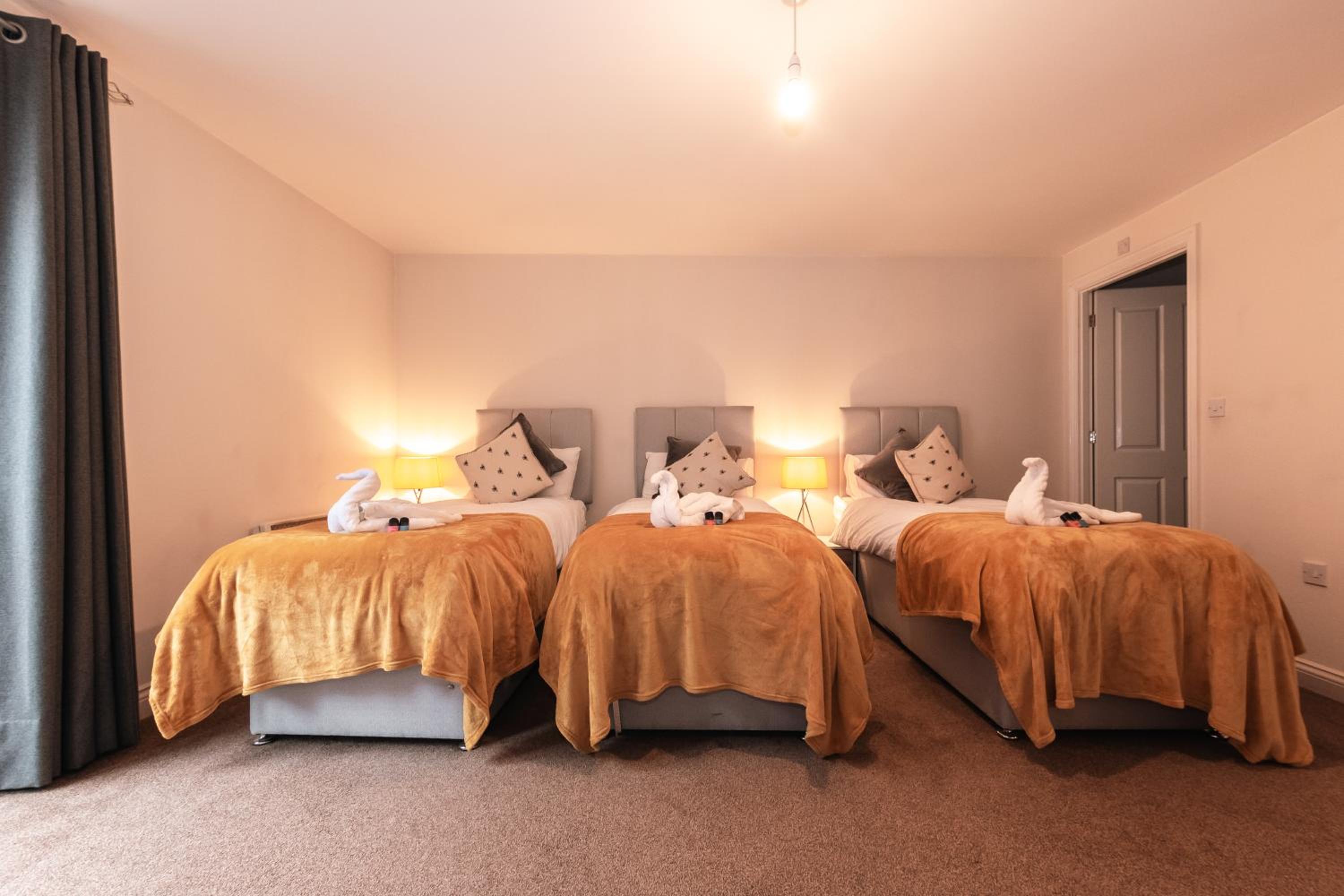 Three-Bedroom Apartment - Photo 40