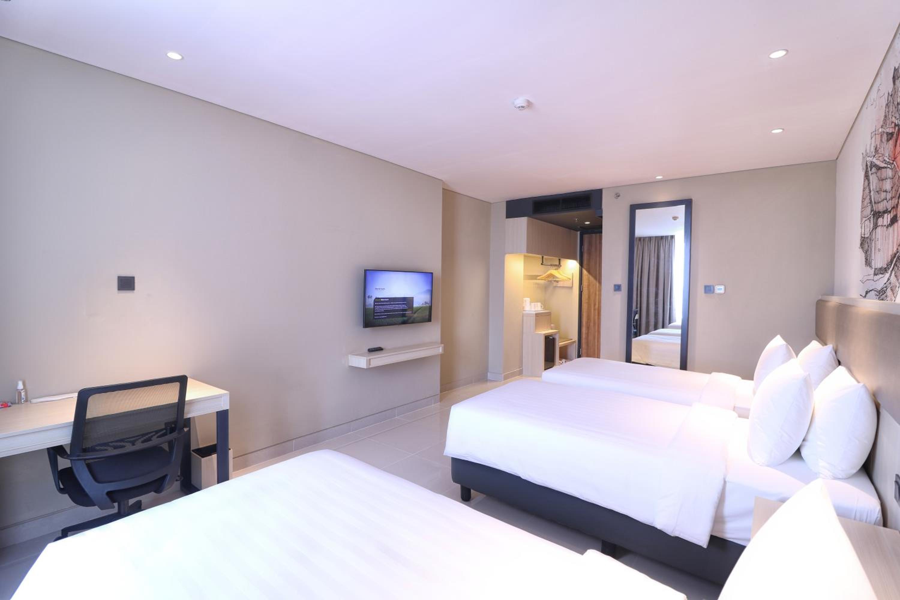 Deluxe Triple Room - Photo 7