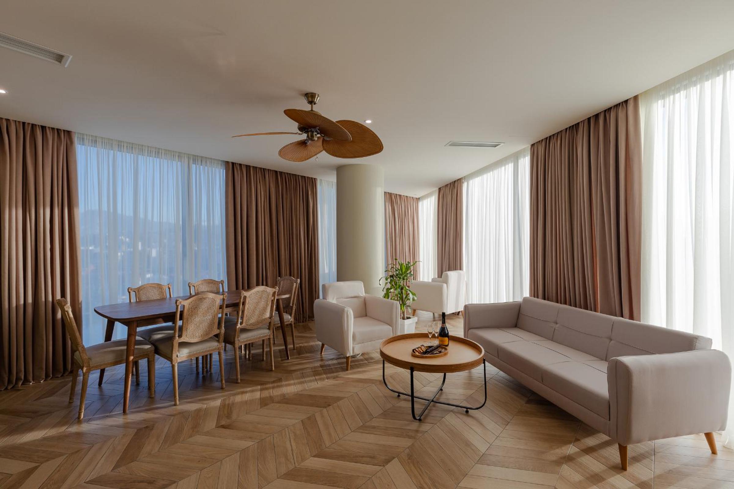 Three-Bedroom Apartment - Photo 2