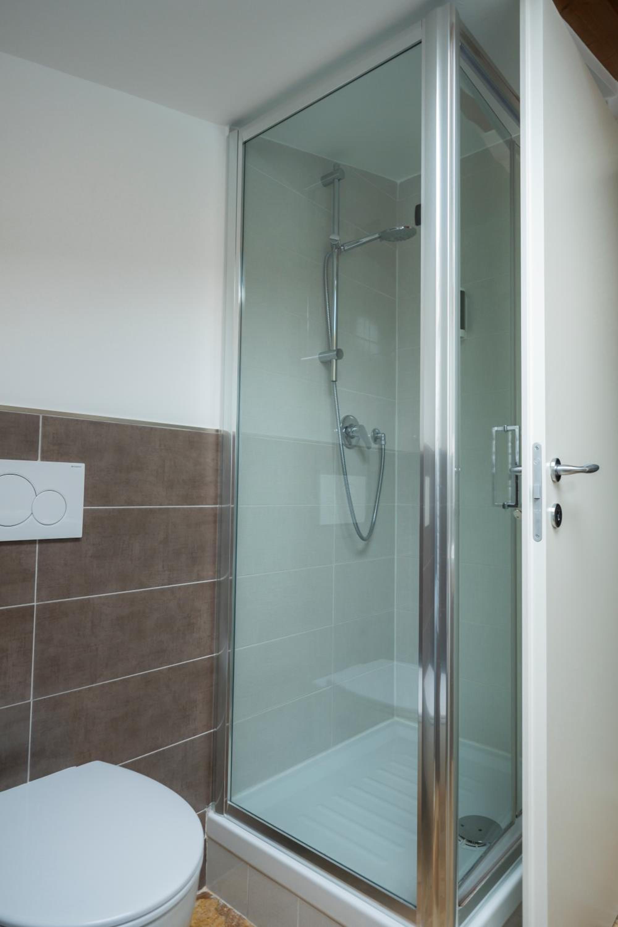 Deluxe Quadruple Room - Photo 14