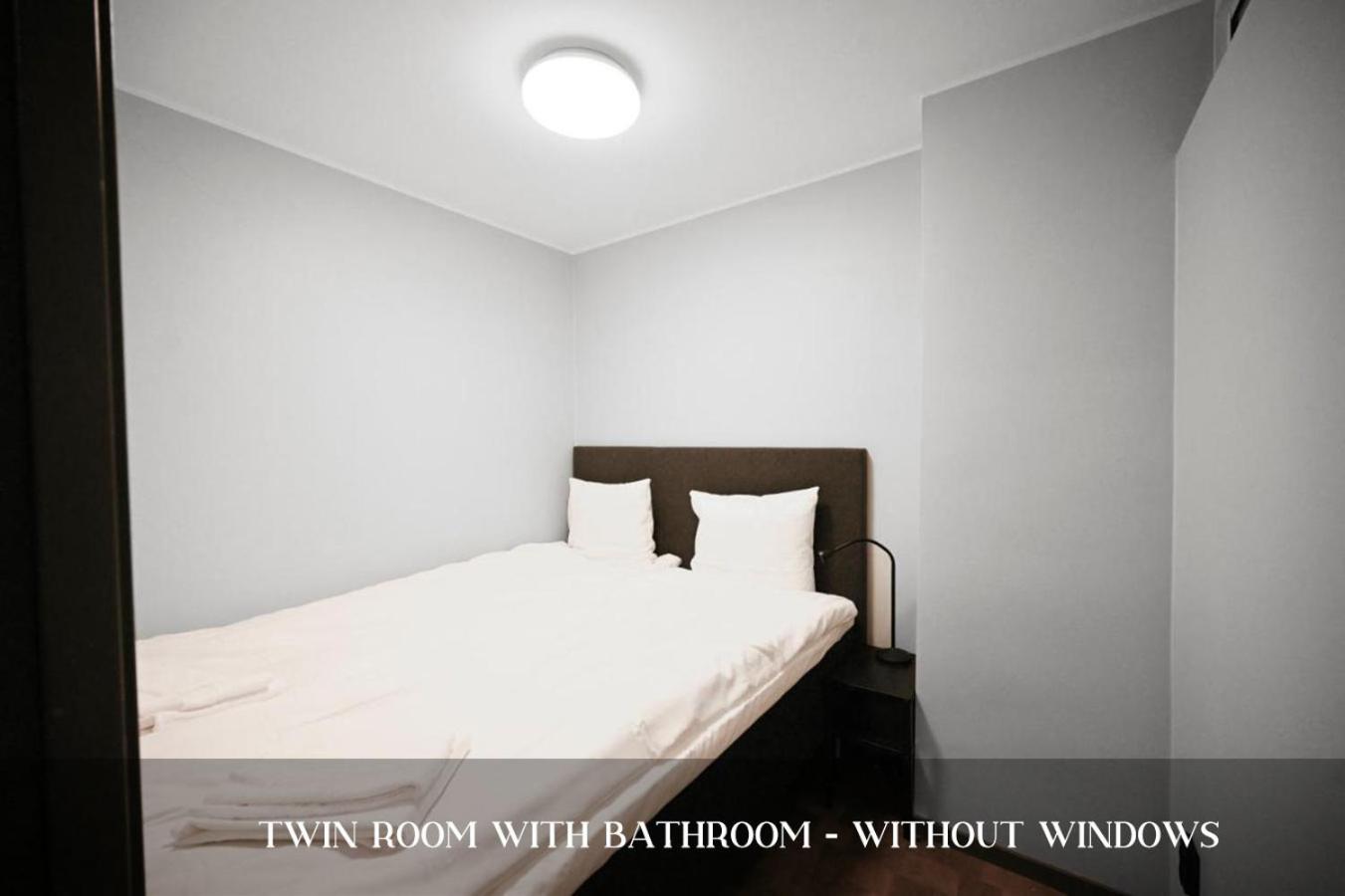 Twin Room with Private Bathroom without Window