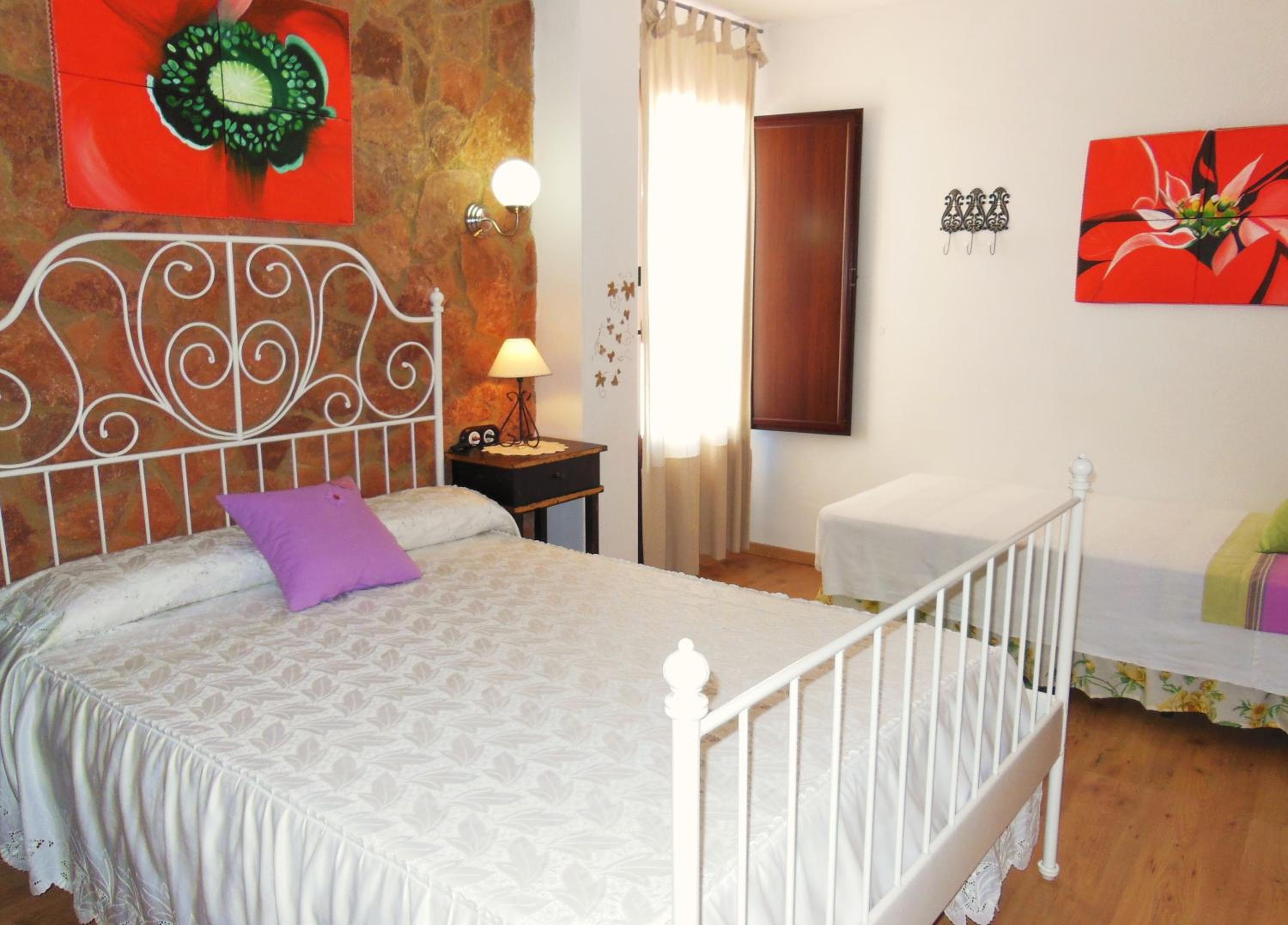 Habitación Triple con Balcón