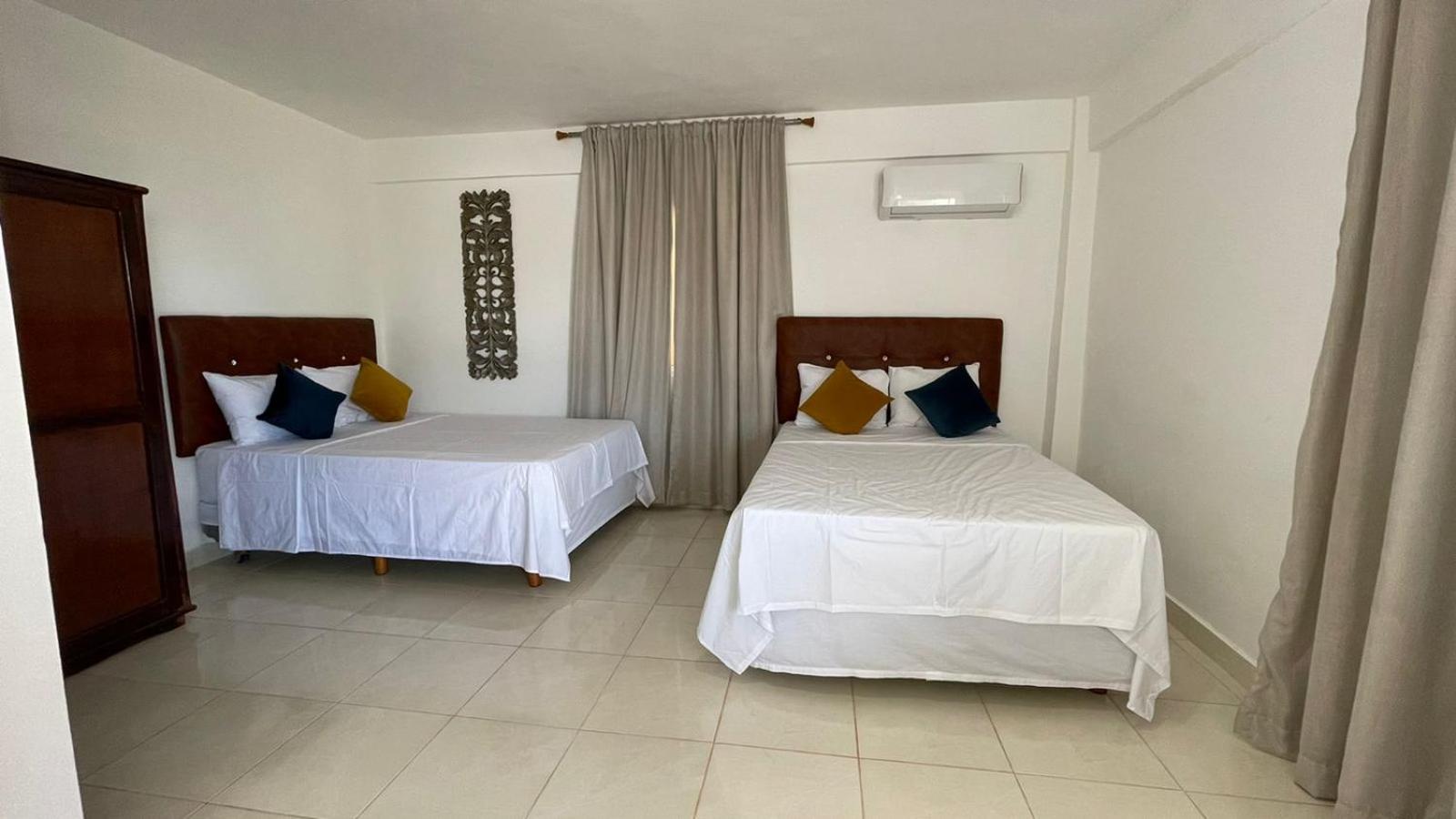 Deluxe Queen Room with Two Queen Beds photo 1