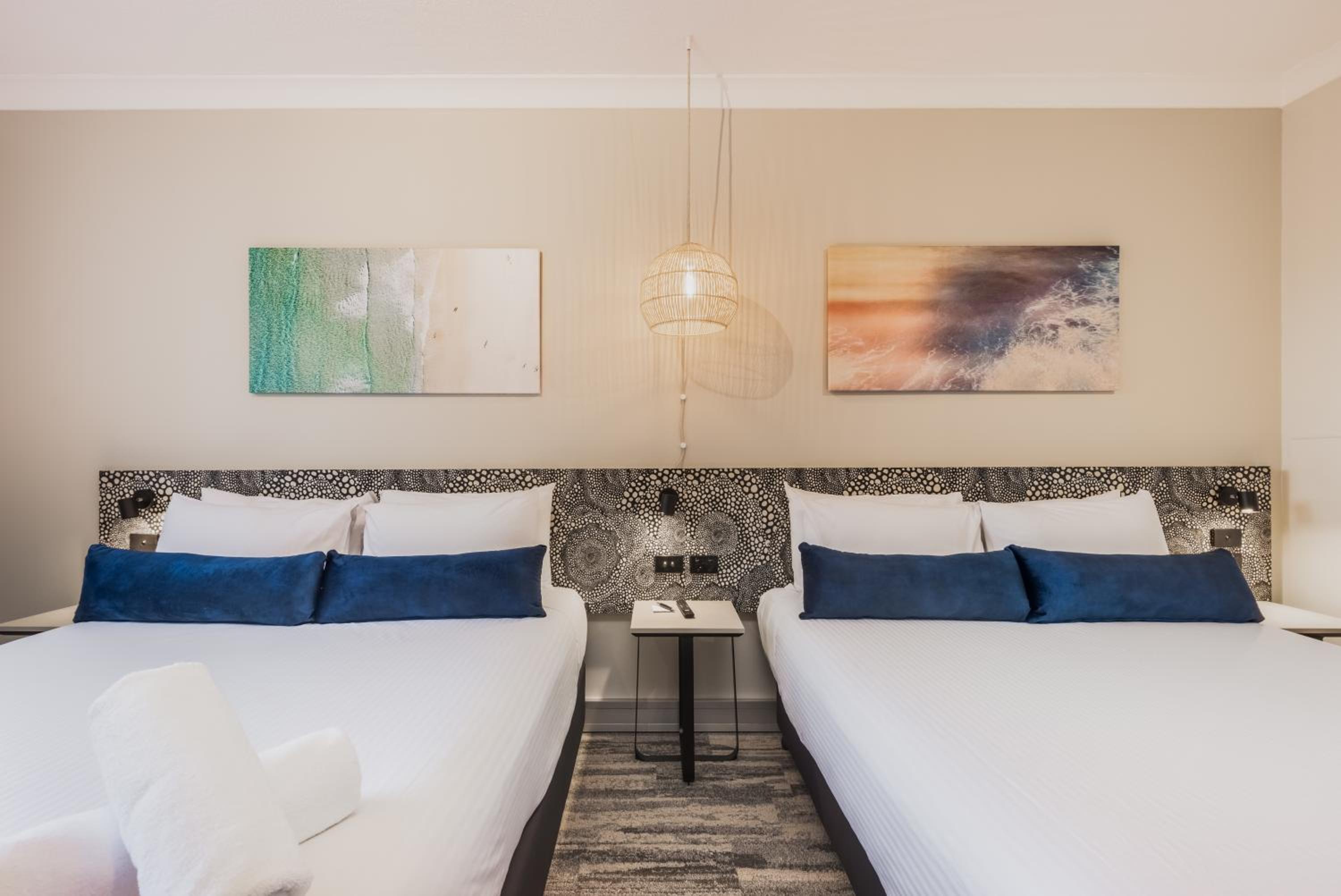 Standard Queen Room with Two Queen Beds - Photo 1