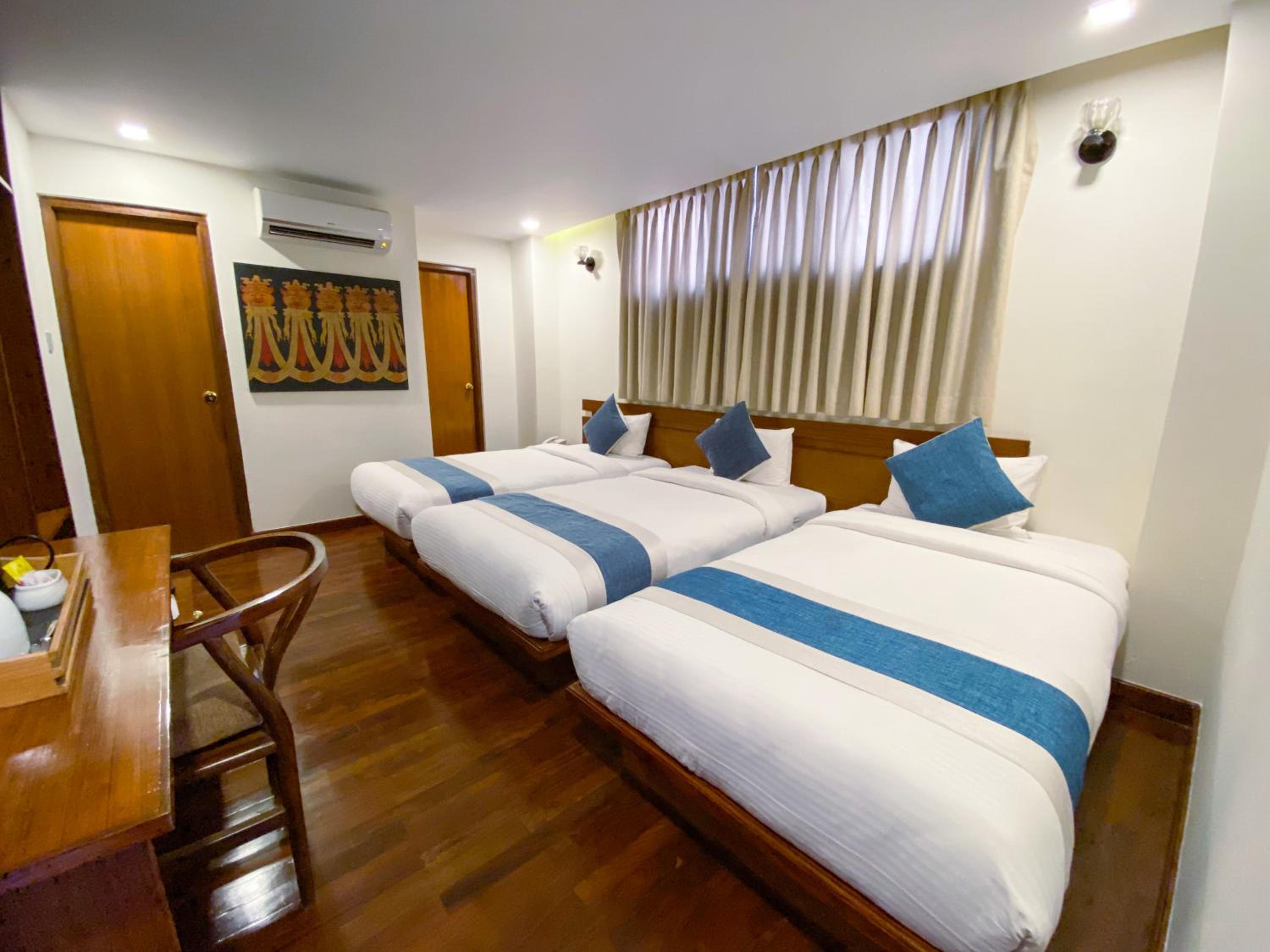 Deluxe Triple Room - Photo 6