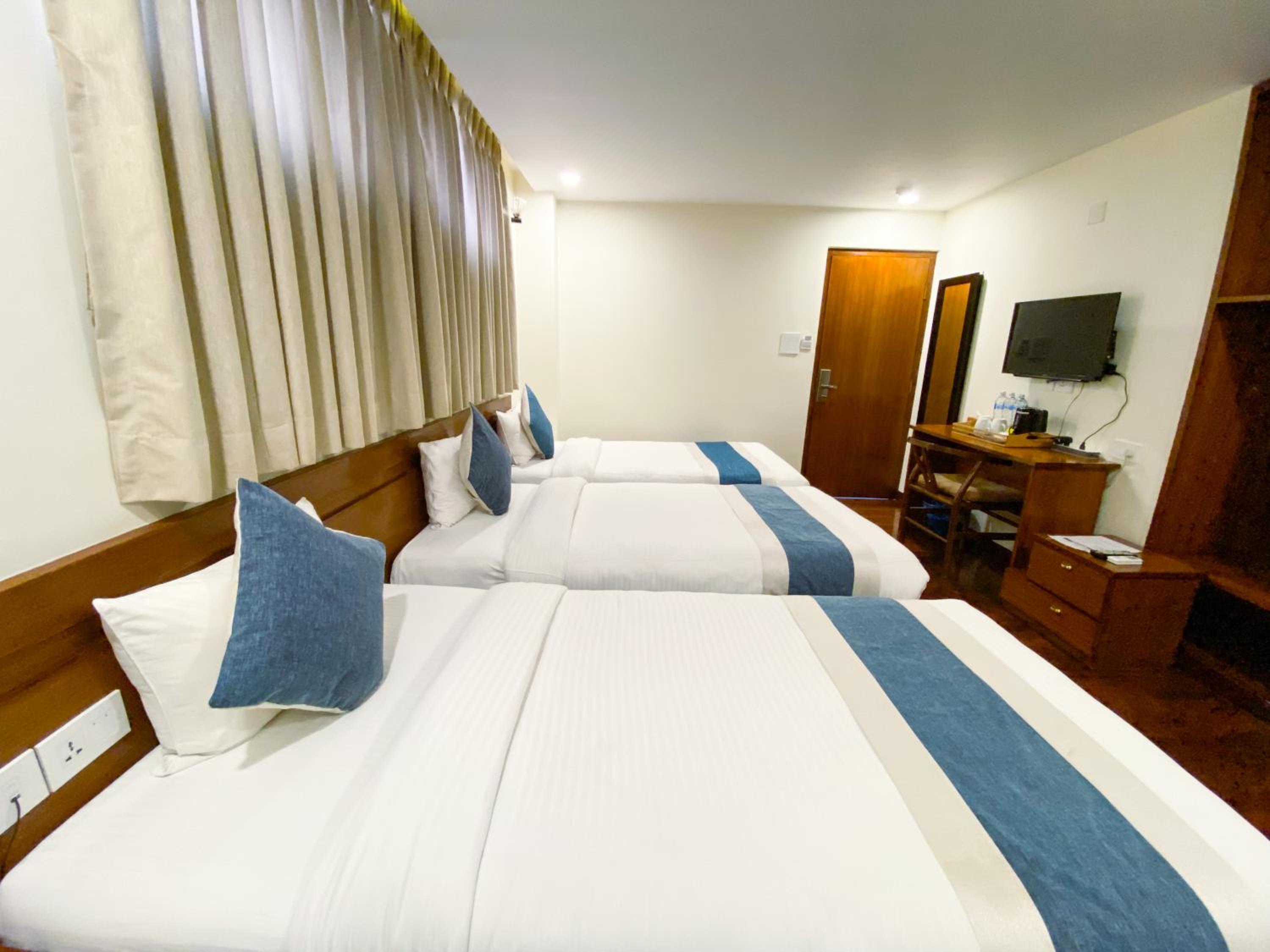 Deluxe Triple Room - Photo 3
