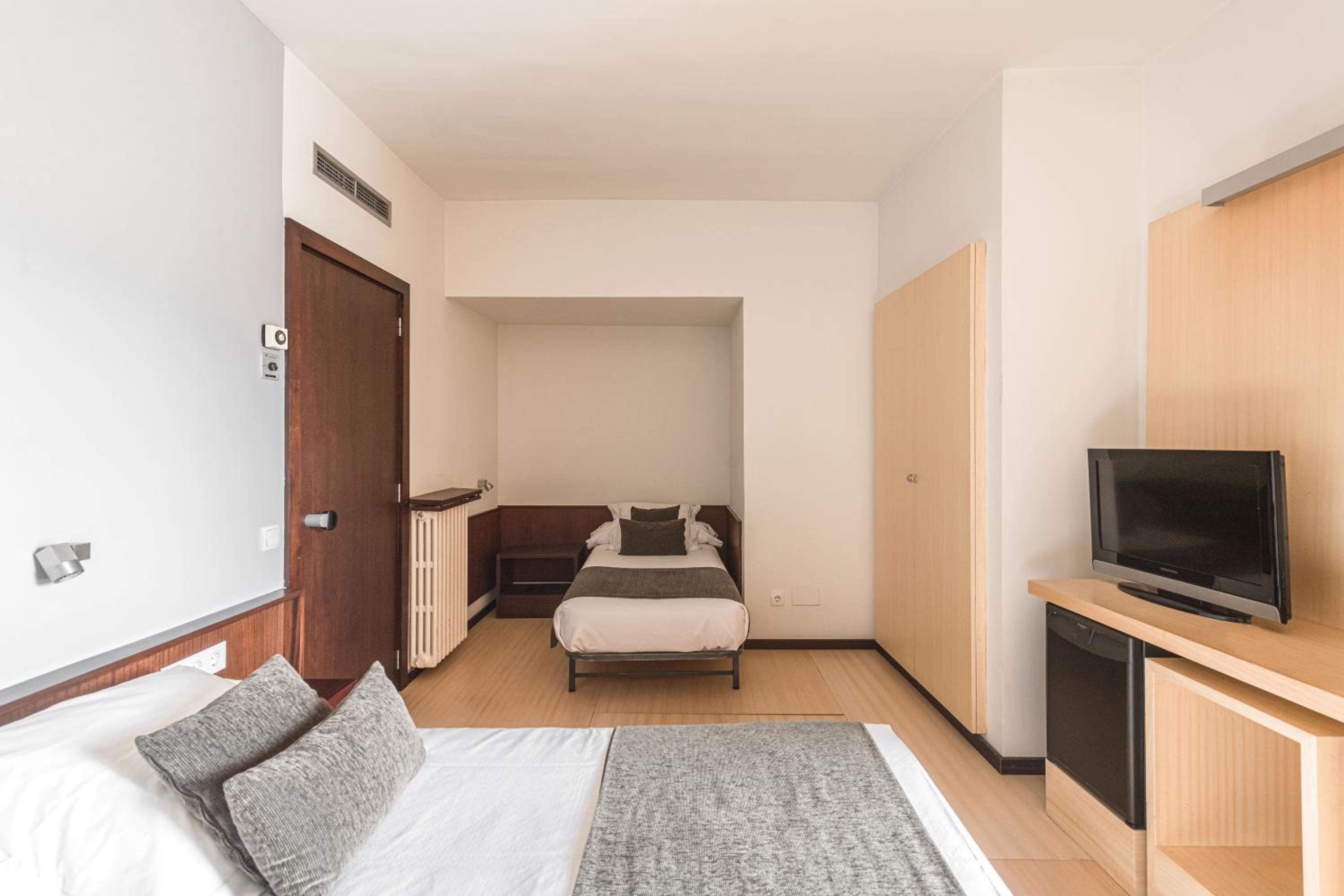 Triple Room - Photo 1