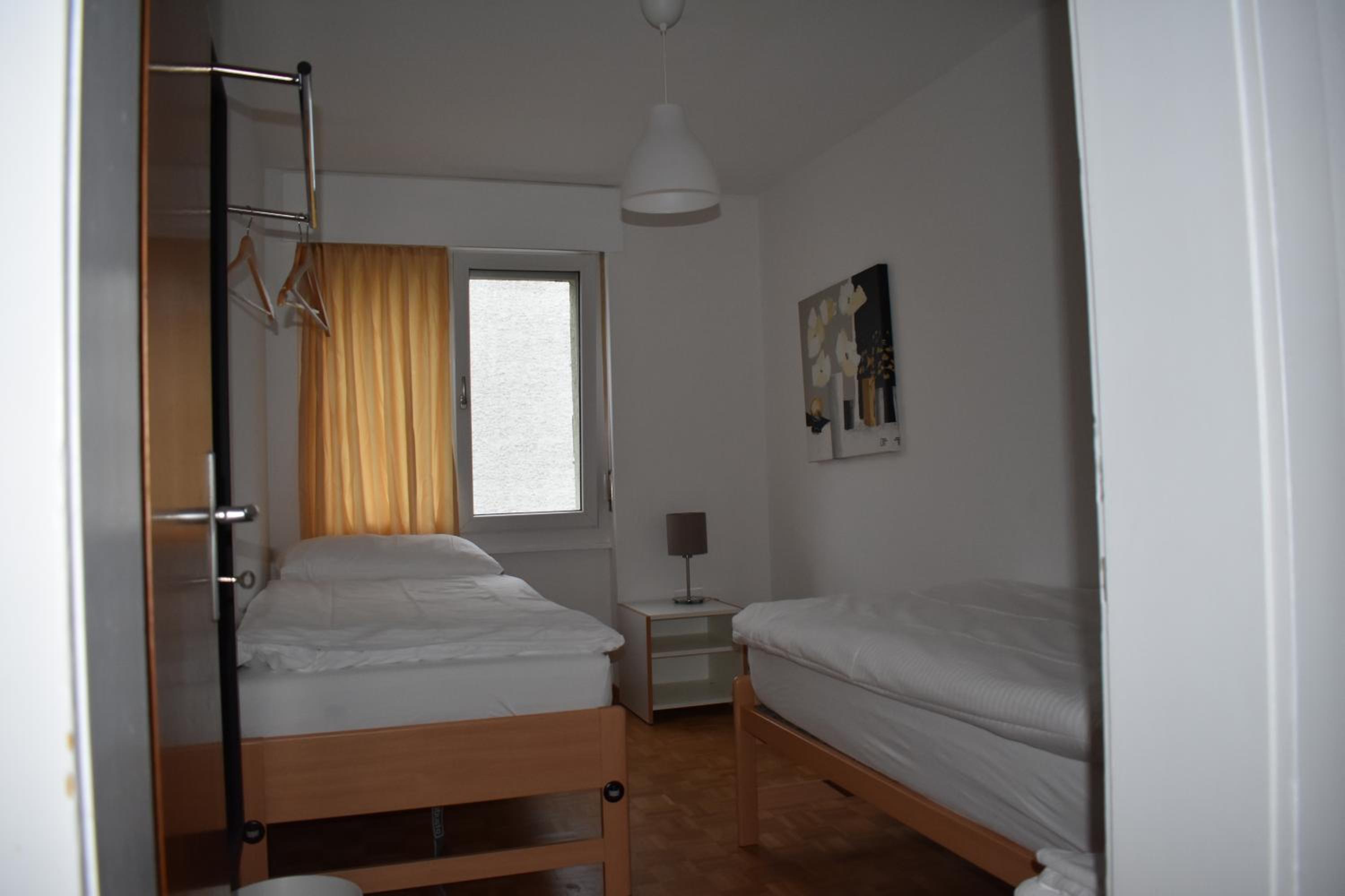 Three-Bedroom Apartment - Photo 1