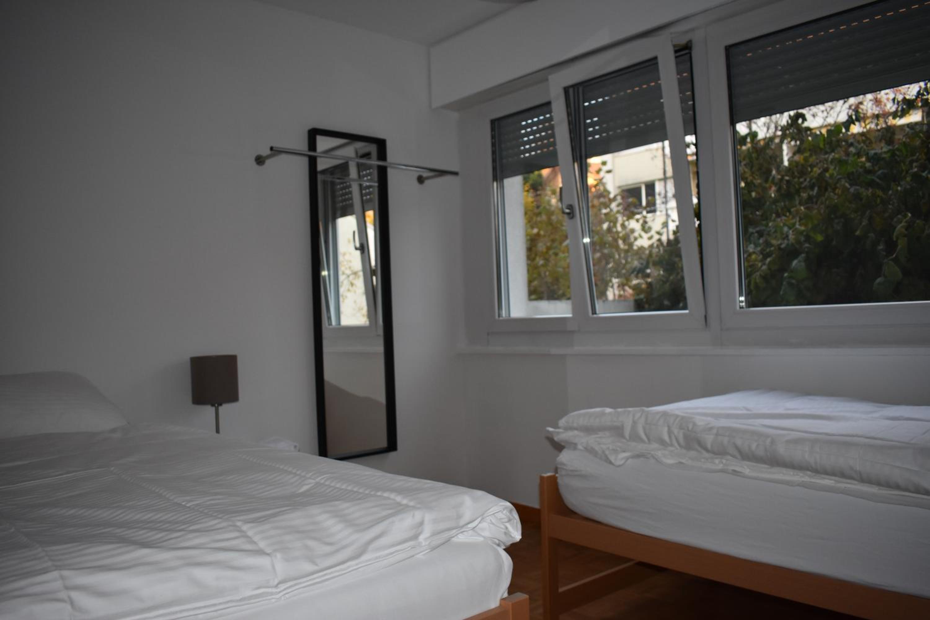 Three-Bedroom Apartment - Photo 2