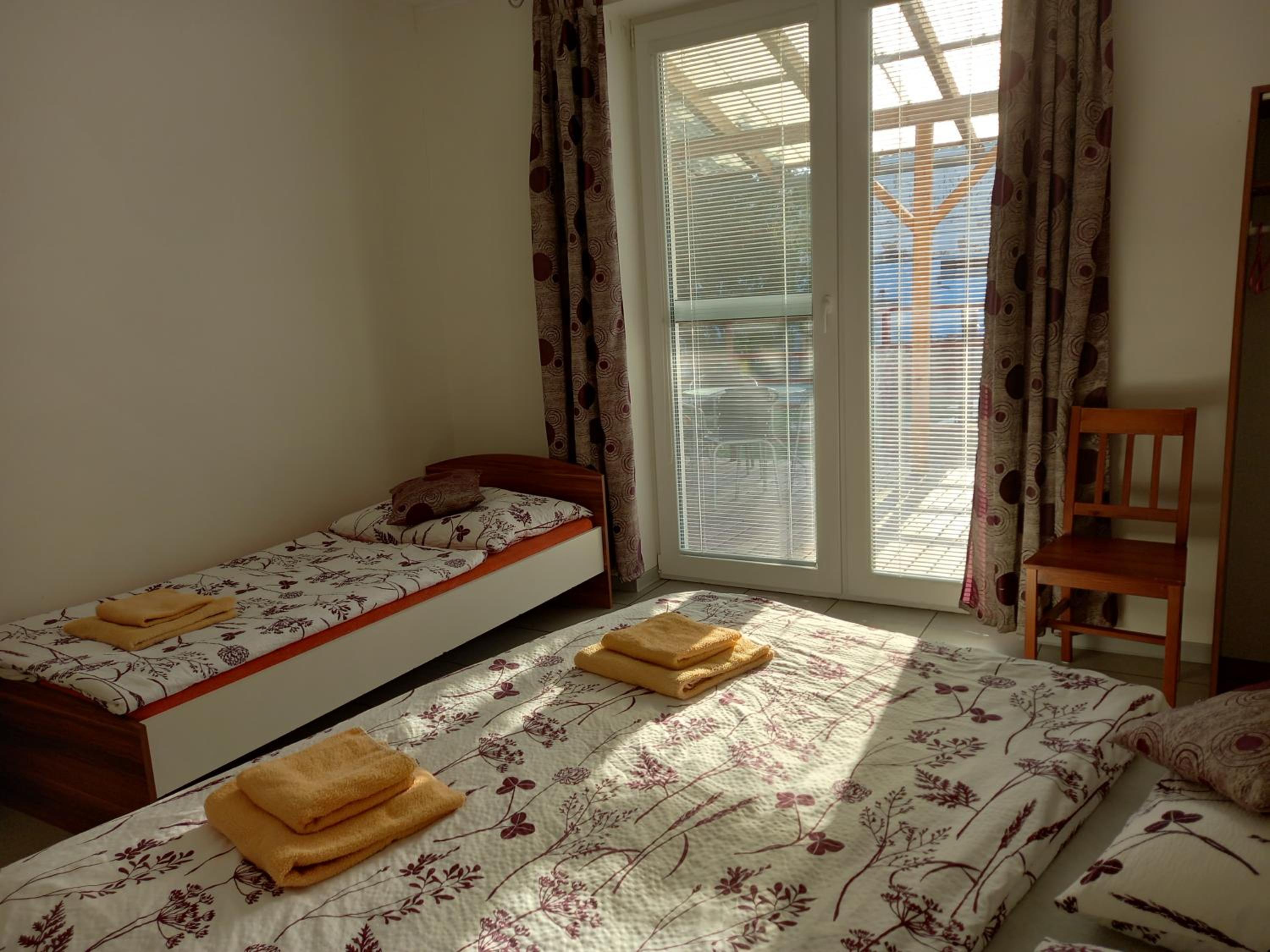 Three-Bedroom Apartment photo 1