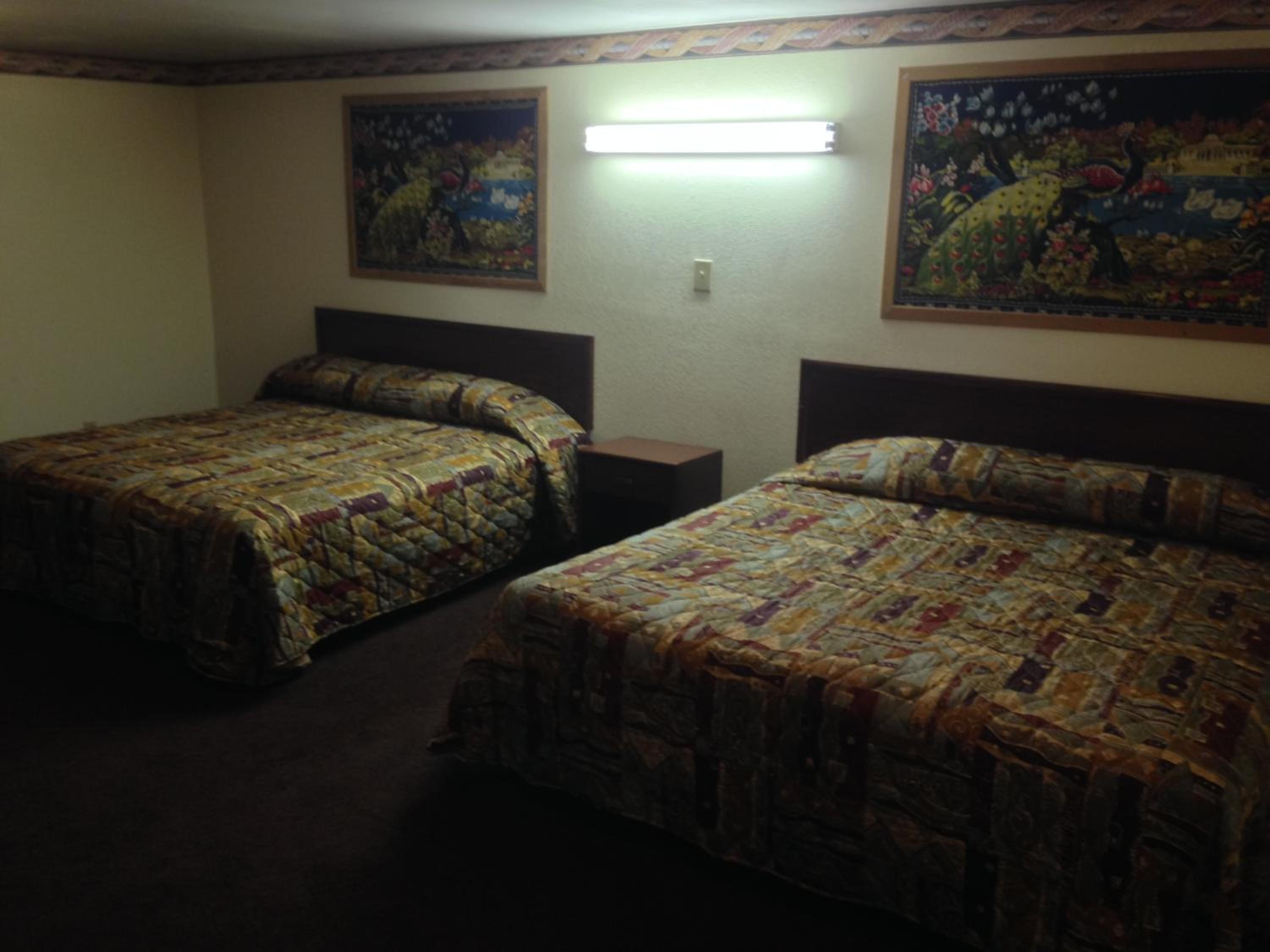 Queen Room with Two Queen Beds - Photo 6