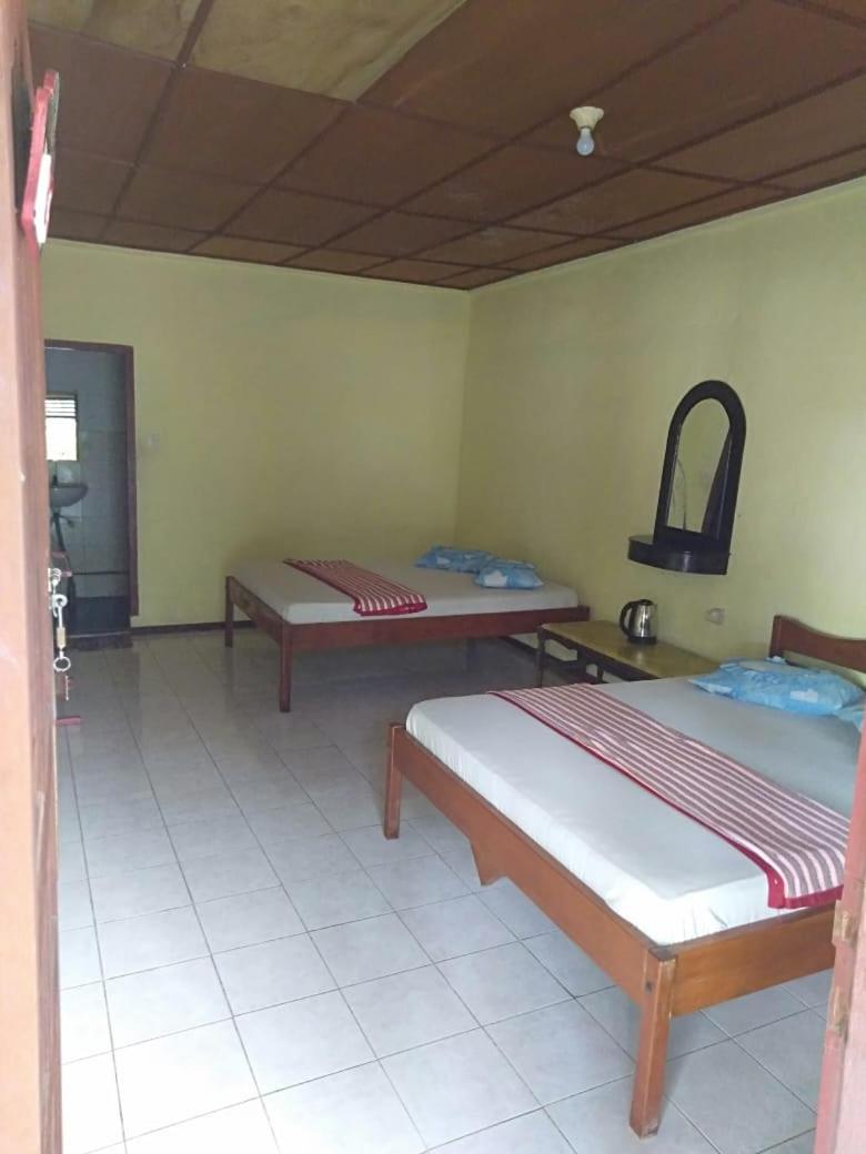 Deluxe Queen Room with Two Queen Beds - Photo 1