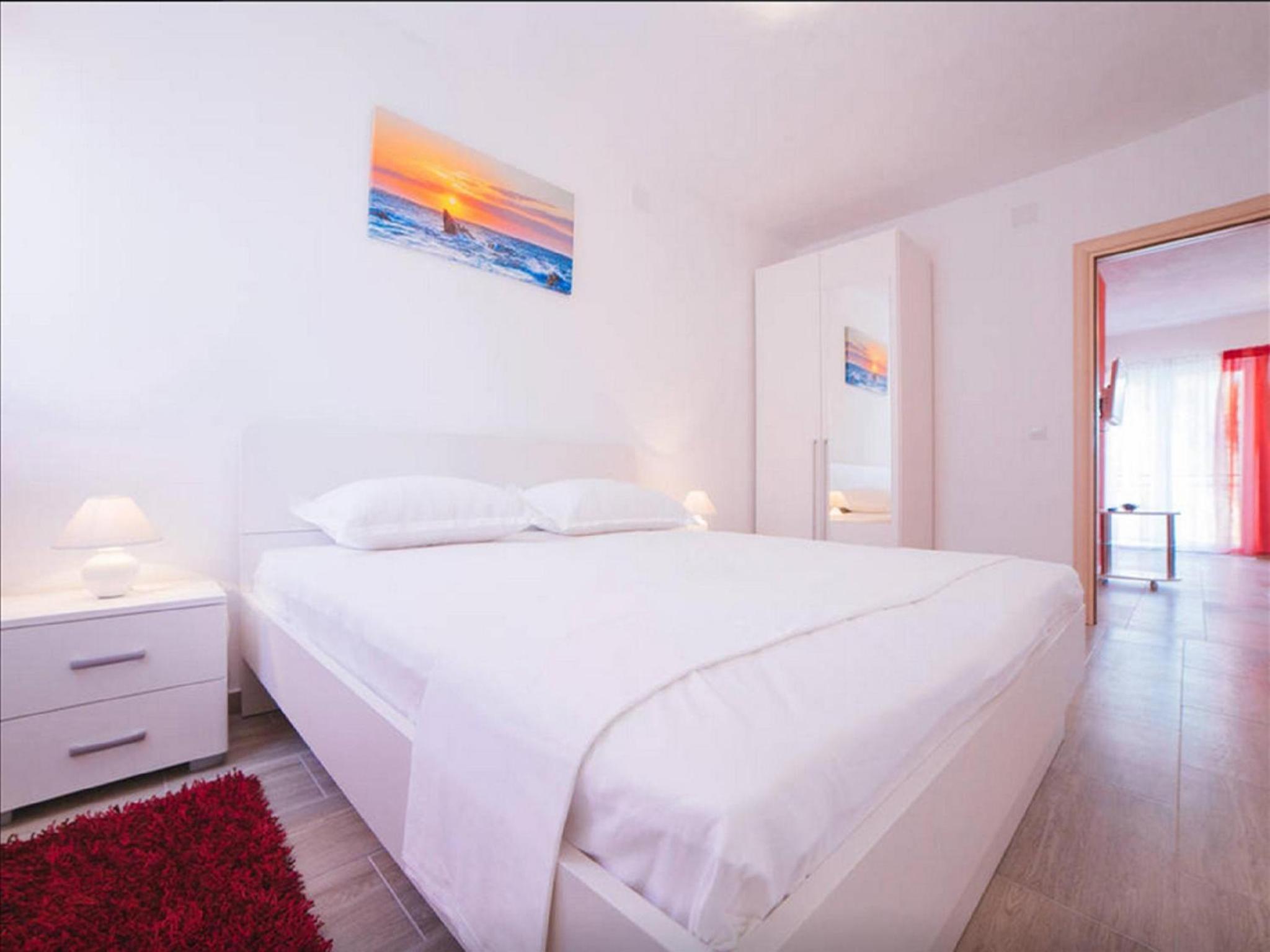One-Bedroom Apartment with Balcony and Sea View