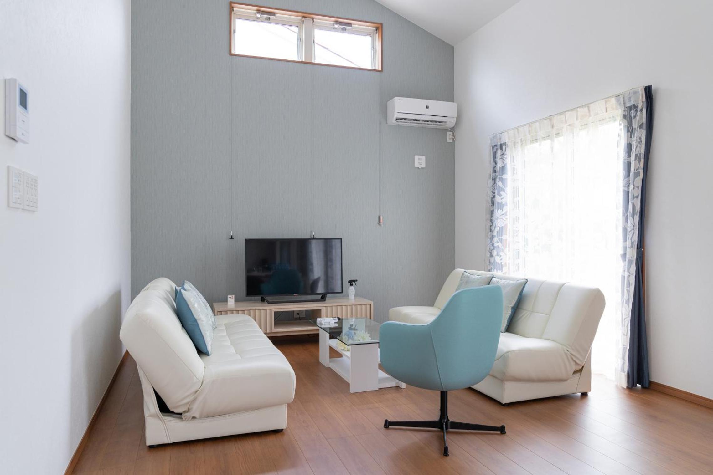 Three-Bedroom House - Photo 16