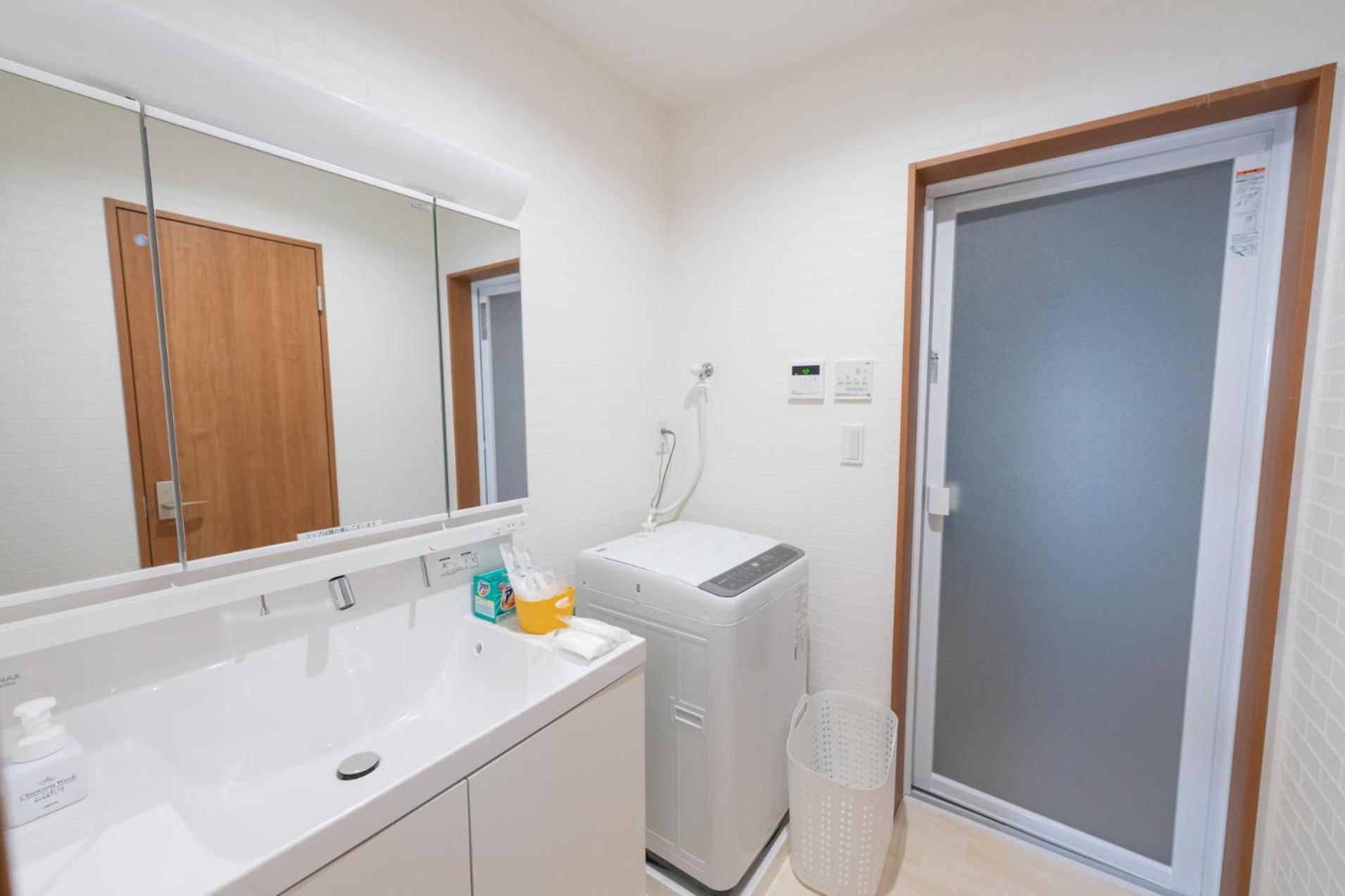 Three-Bedroom House - Photo 10