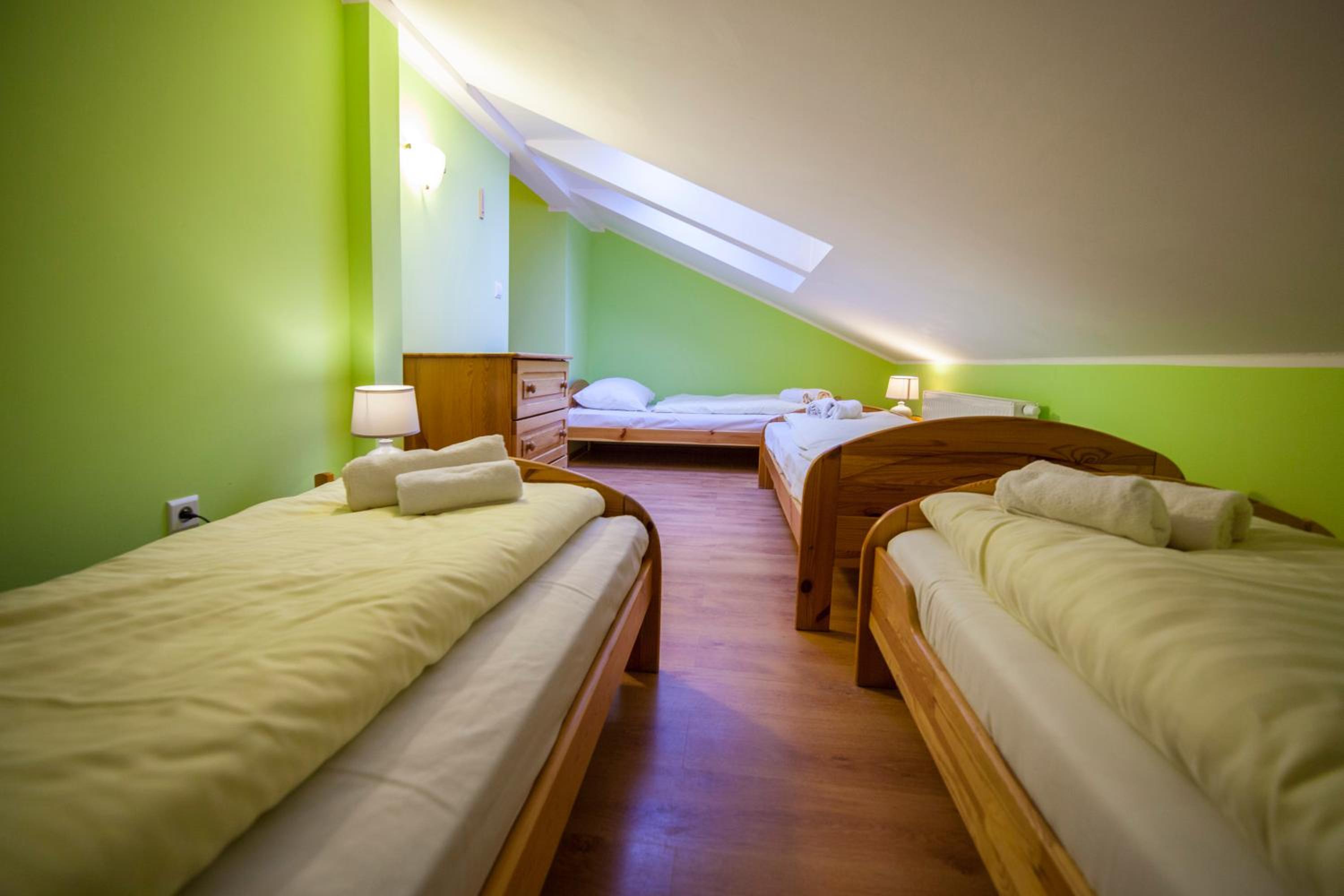 Quadruple Room with Private Bathroom - Photo 1