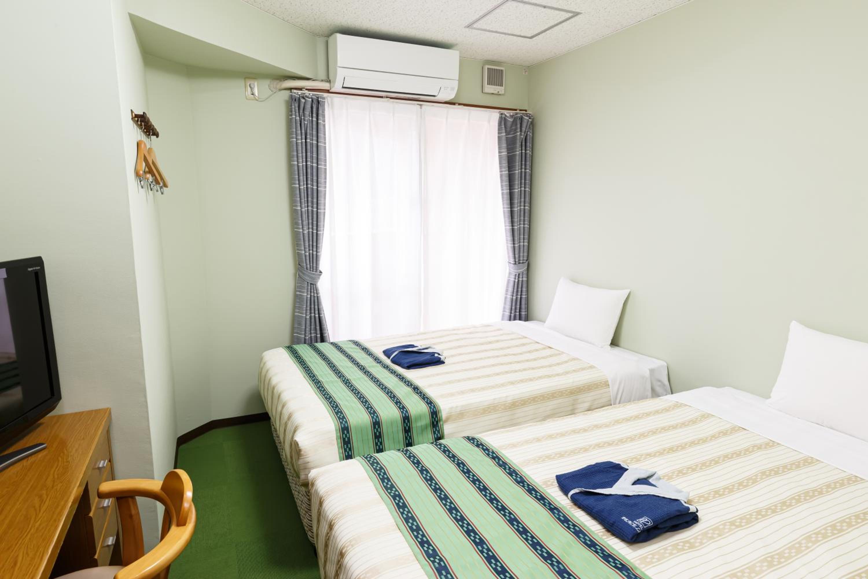 Twin Room - Photo 1
