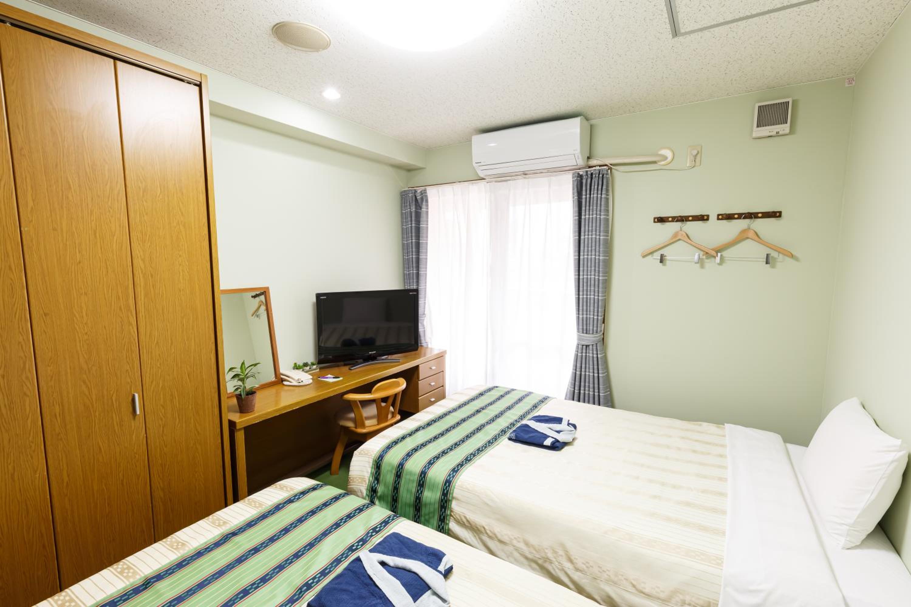 Twin Room - Photo 6