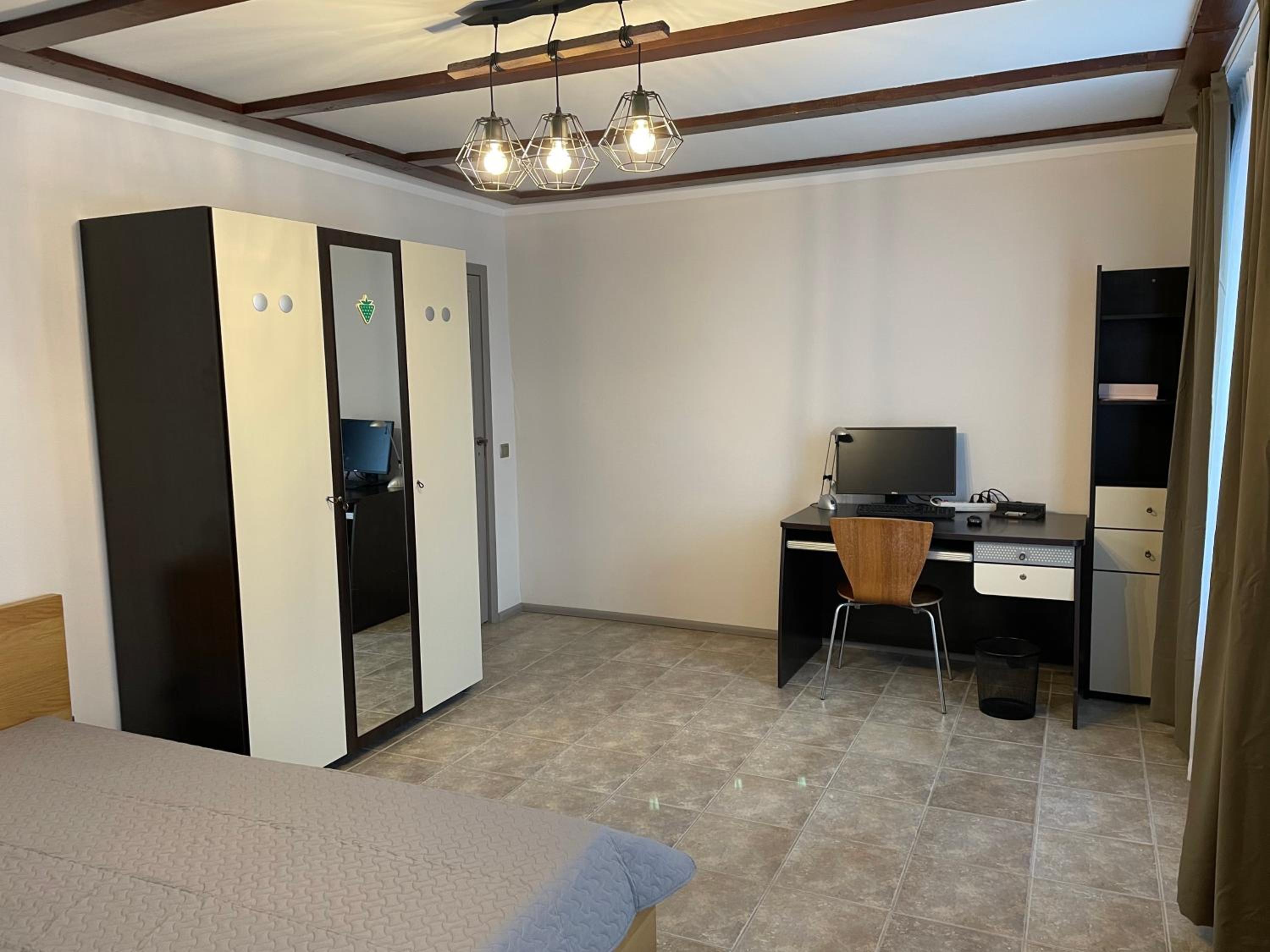 Three-Bedroom House - Photo 16