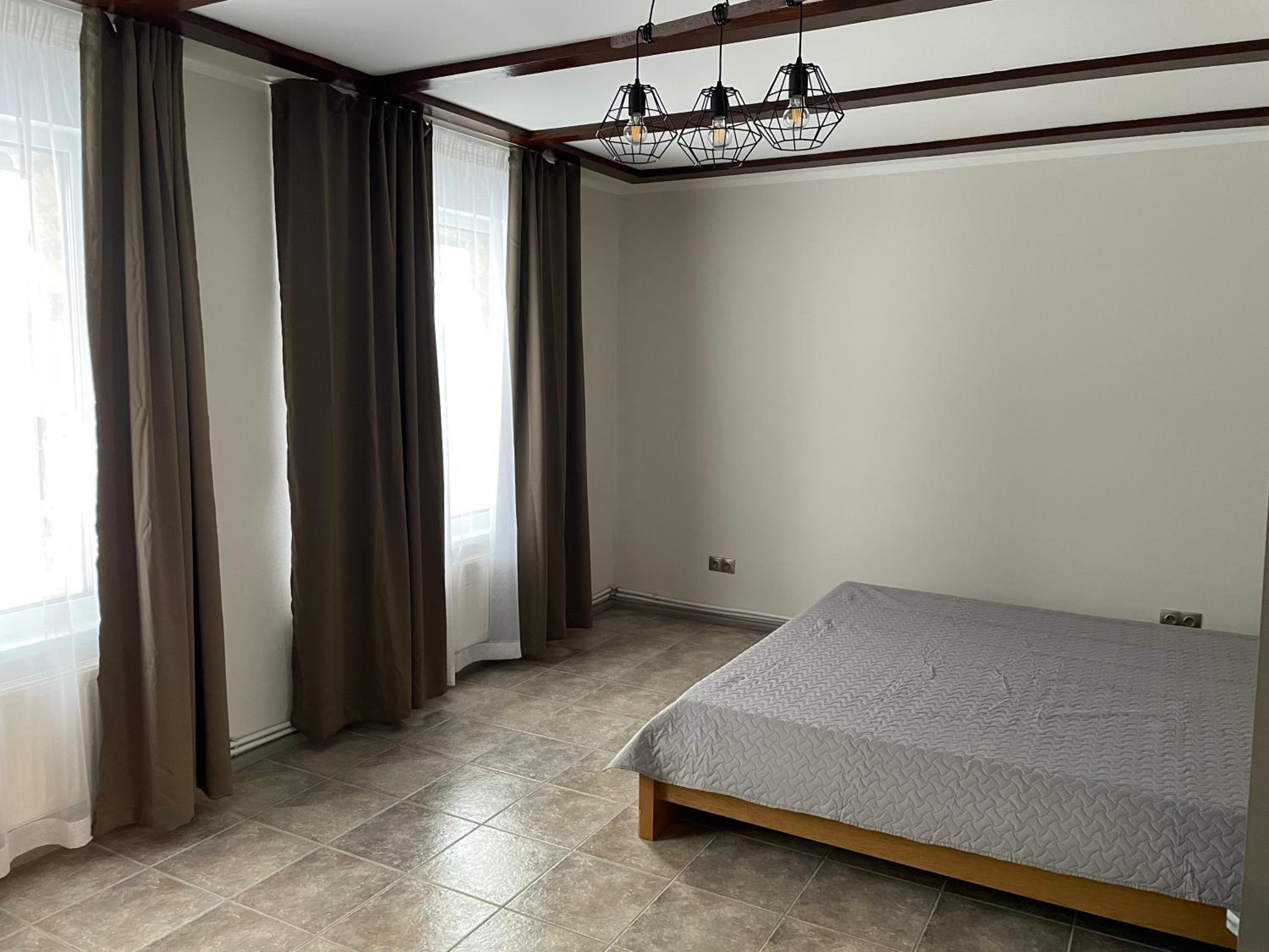 Three-Bedroom House - Photo 1
