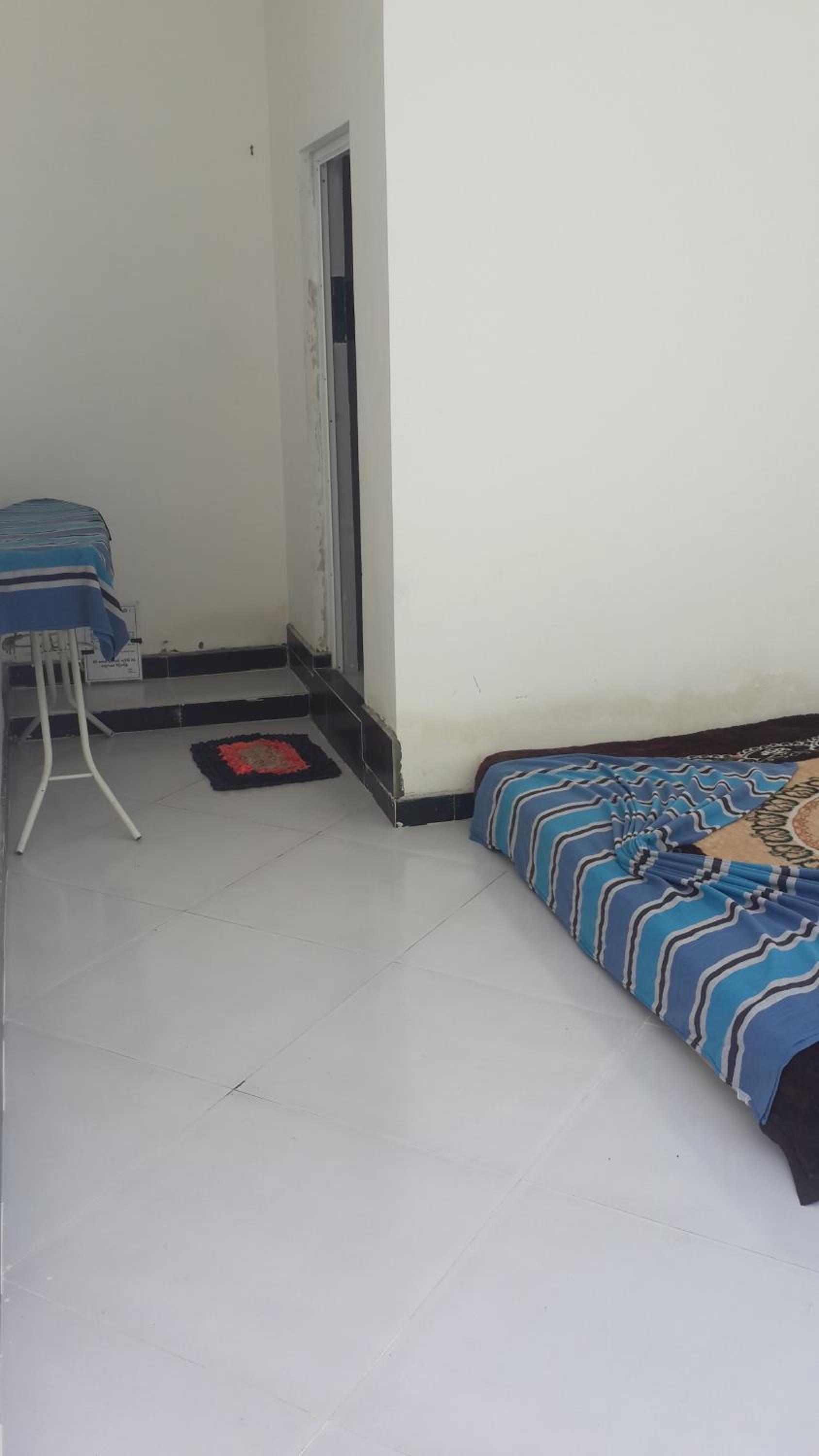 Basic Triple Room With Shared Bathroom photo 3