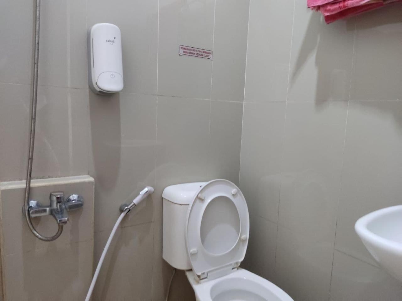 Deluxe Family Suite - Photo 17