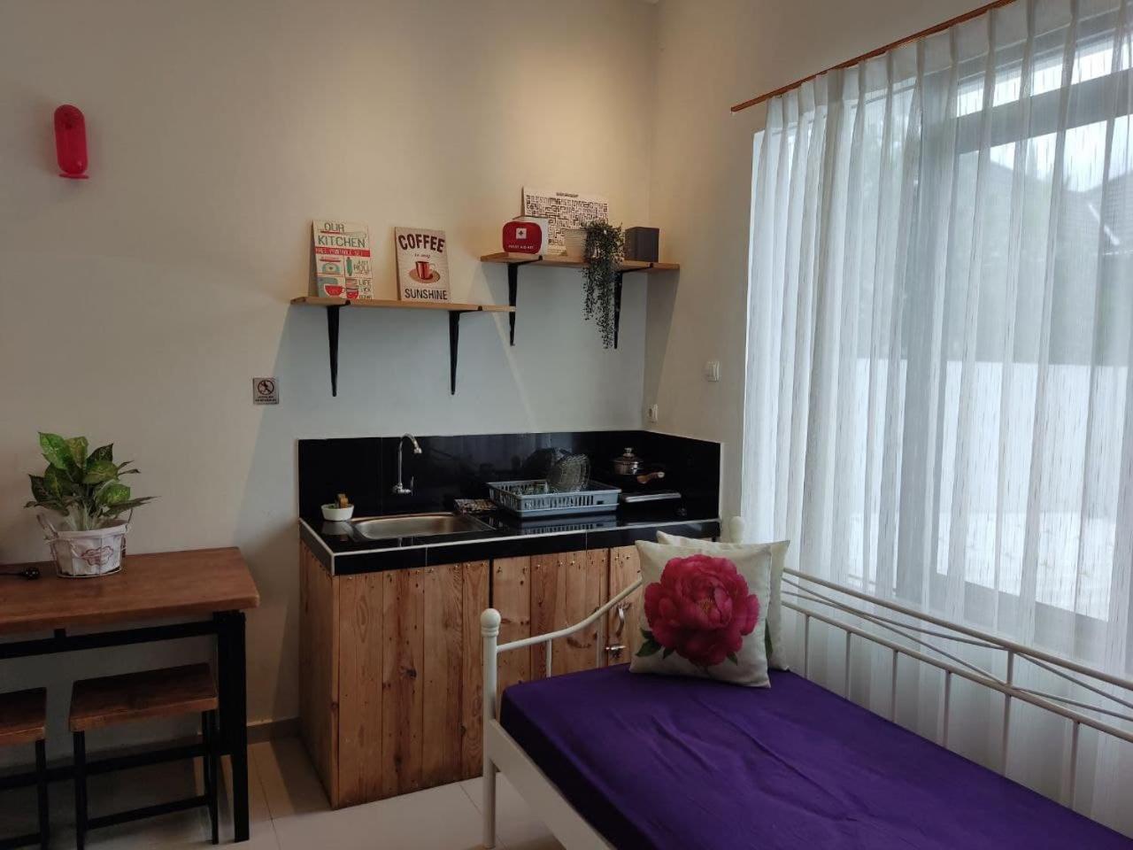 Deluxe Family Suite - Photo 11