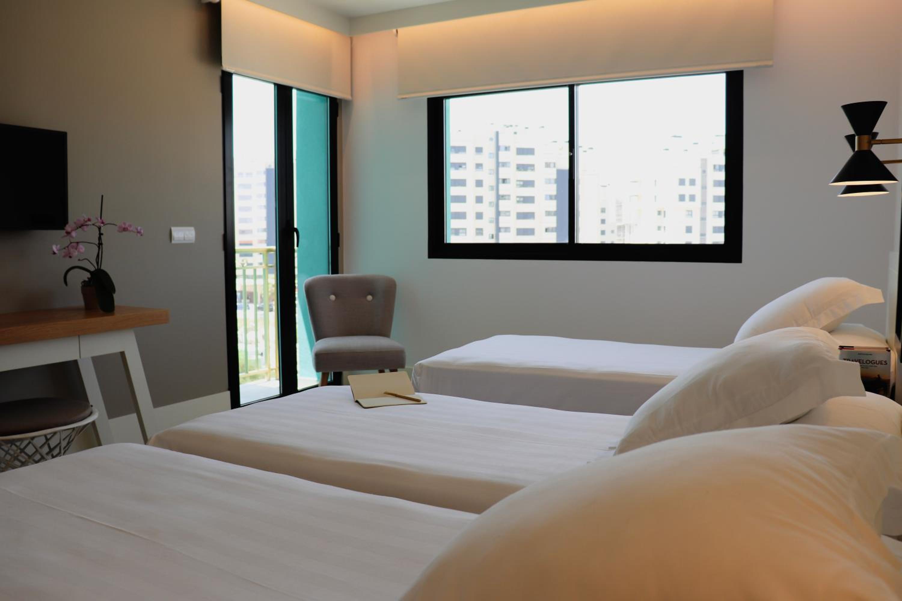 Double Room with Extra Bed (2 Adults + 1 Child) photo 3