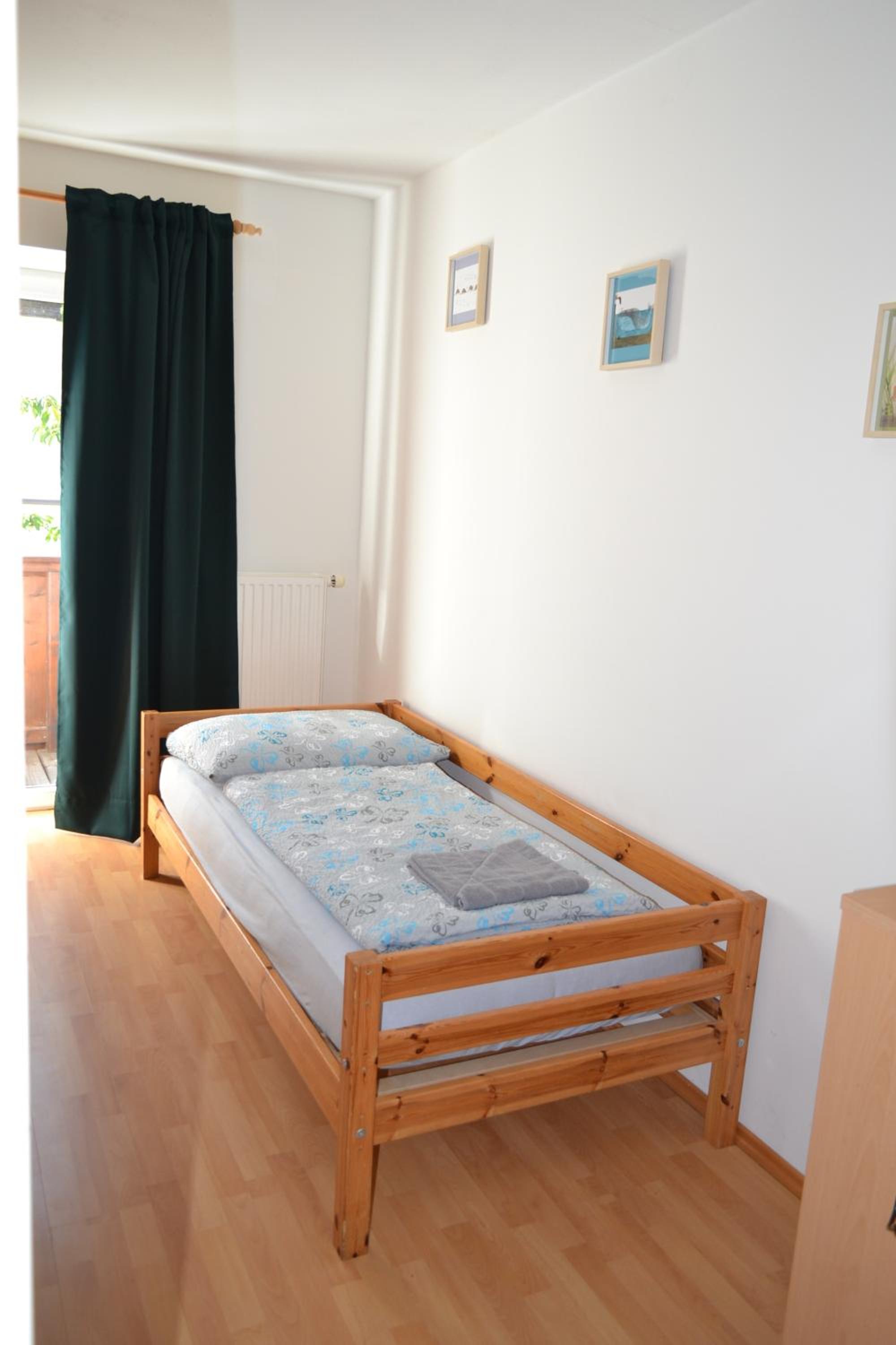 Three-Bedroom Apartment - Photo 19